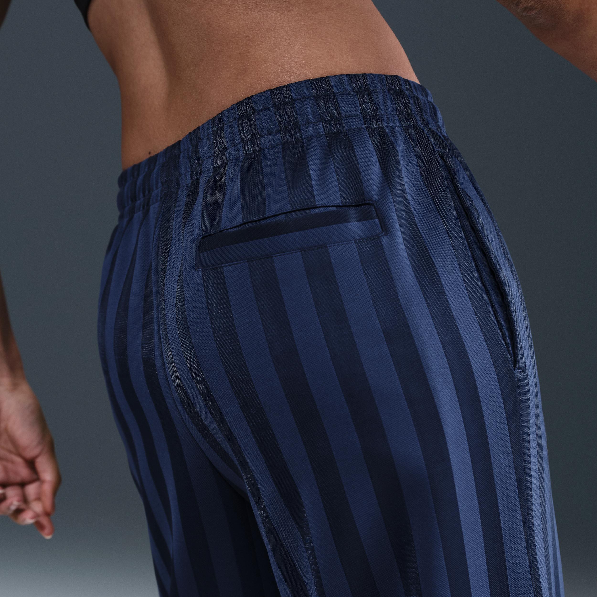 Women's Nike Sportswear Mid-Rise Loose Jacquard Striped Track Pants Product Image