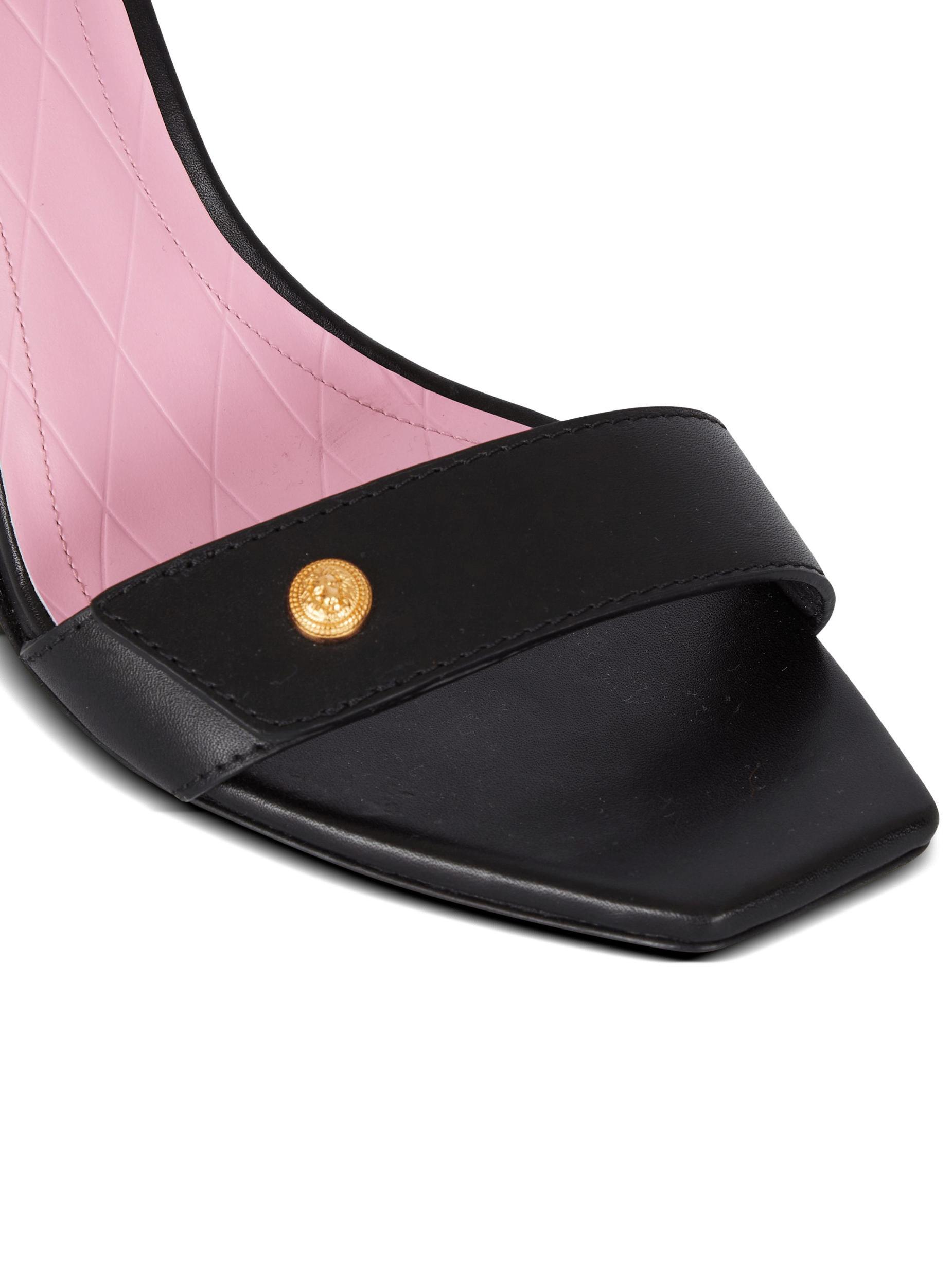 Heeled Eva sandals in calfskin Product Image