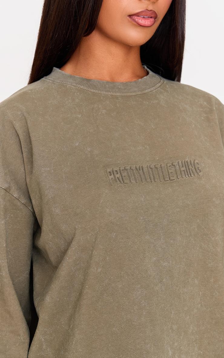 PRETTYLITTLETHING Olive Embossed Logo Washed Long Sleeve T-shirt Product Image