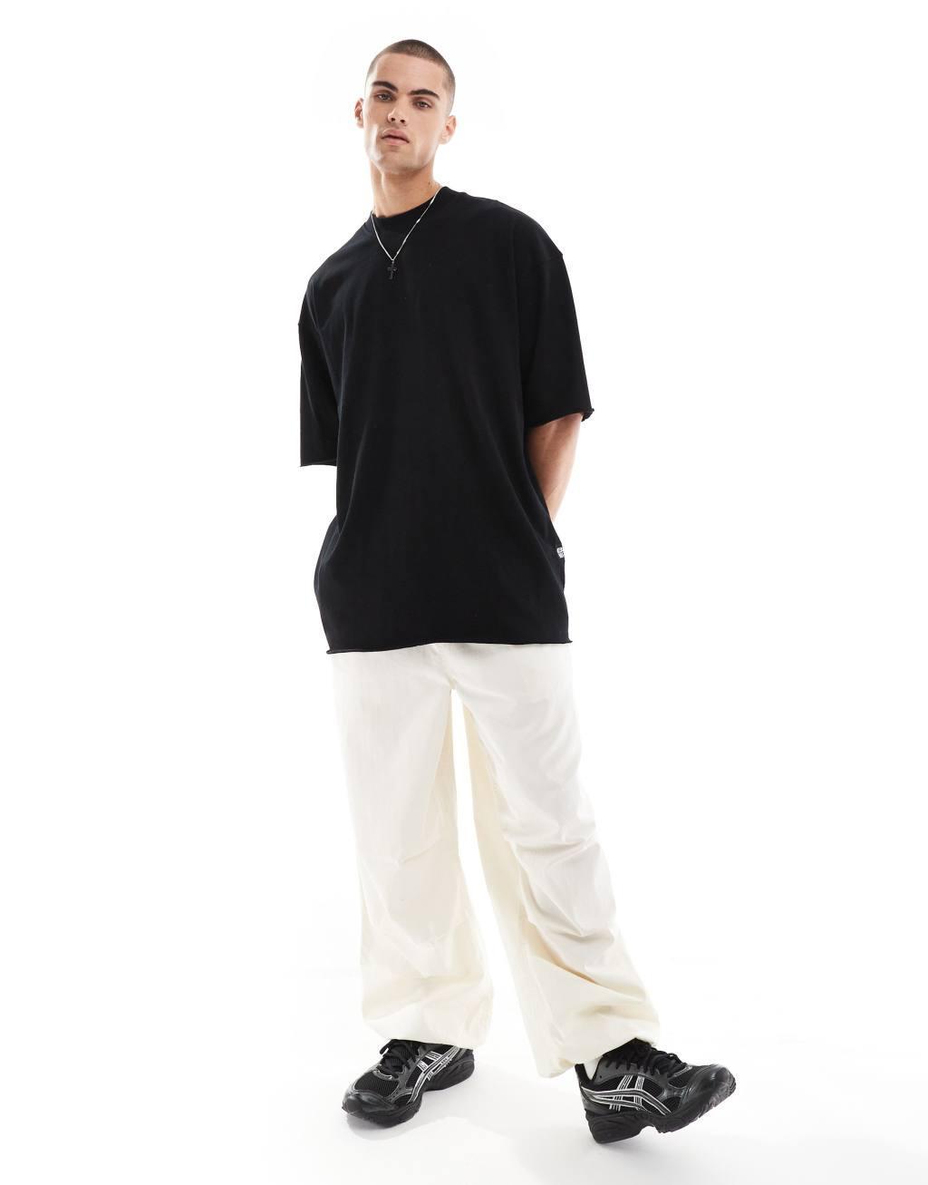 Bershka boxy oversized fit T-shirt in black Product Image