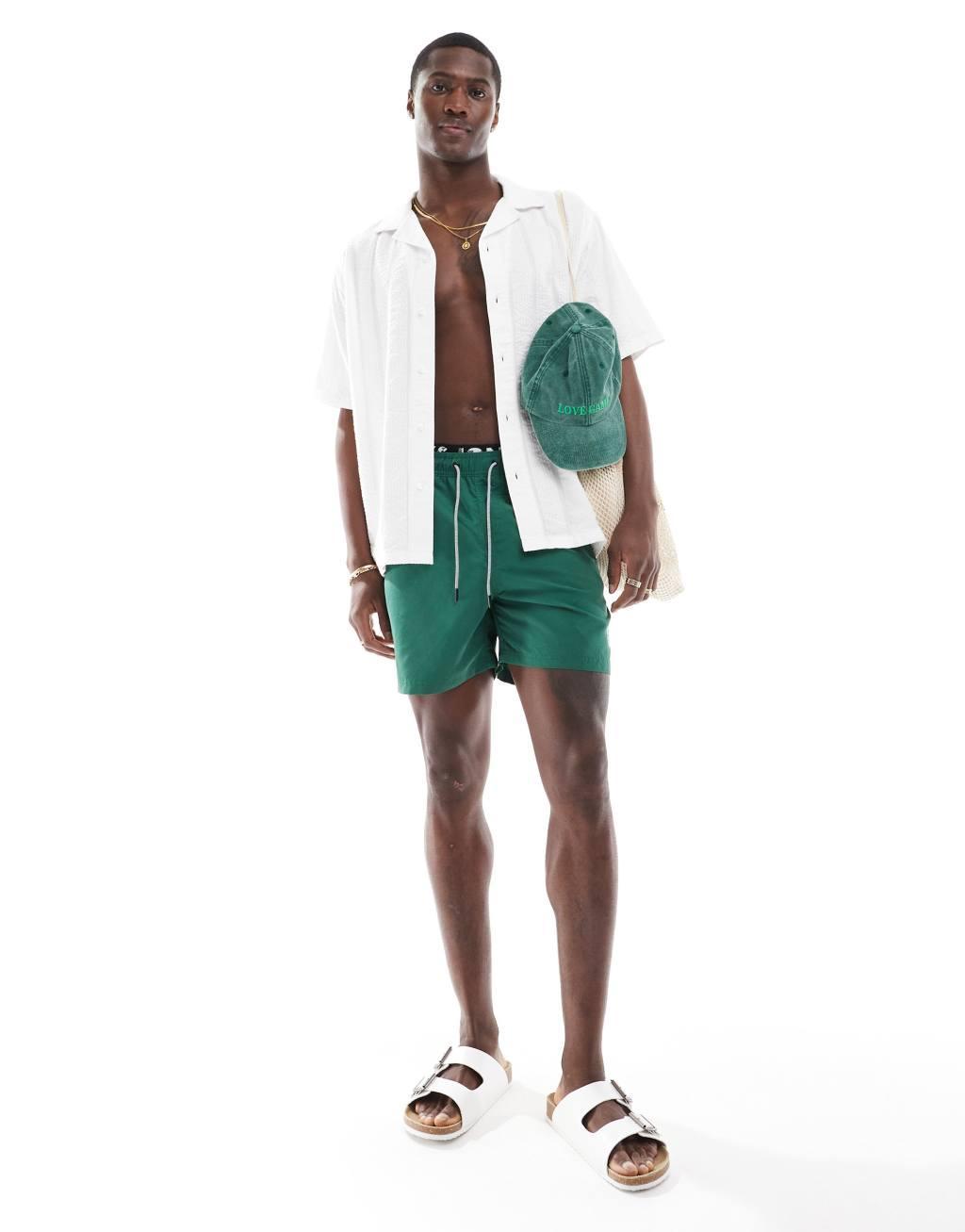 Jack & Jones double waistband swim shorts in green  Product Image
