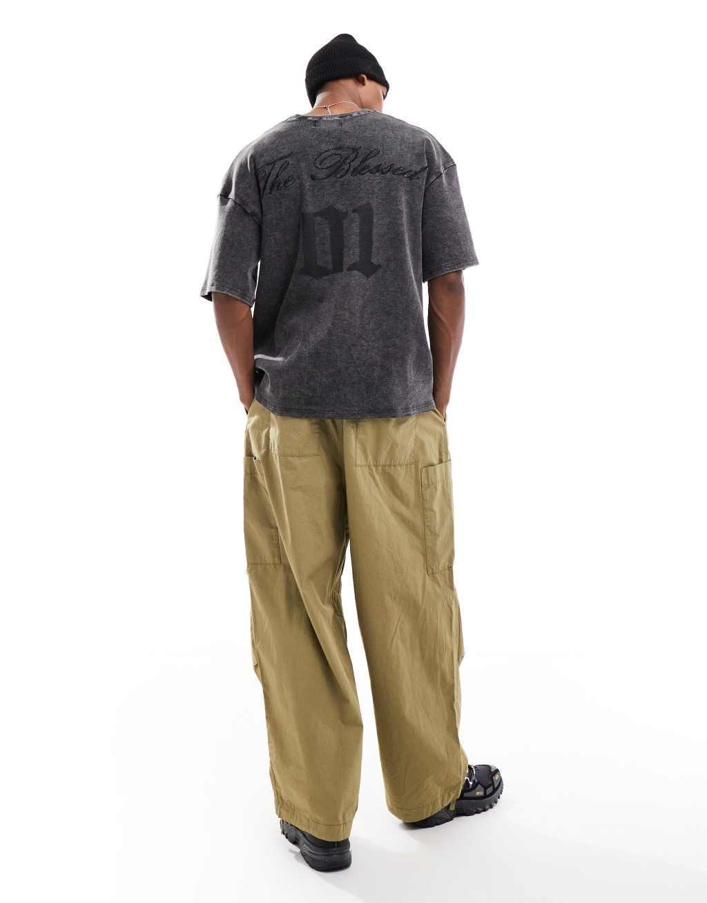 Liquor N Poker textured ribbed varsity T-shirt in black Product Image