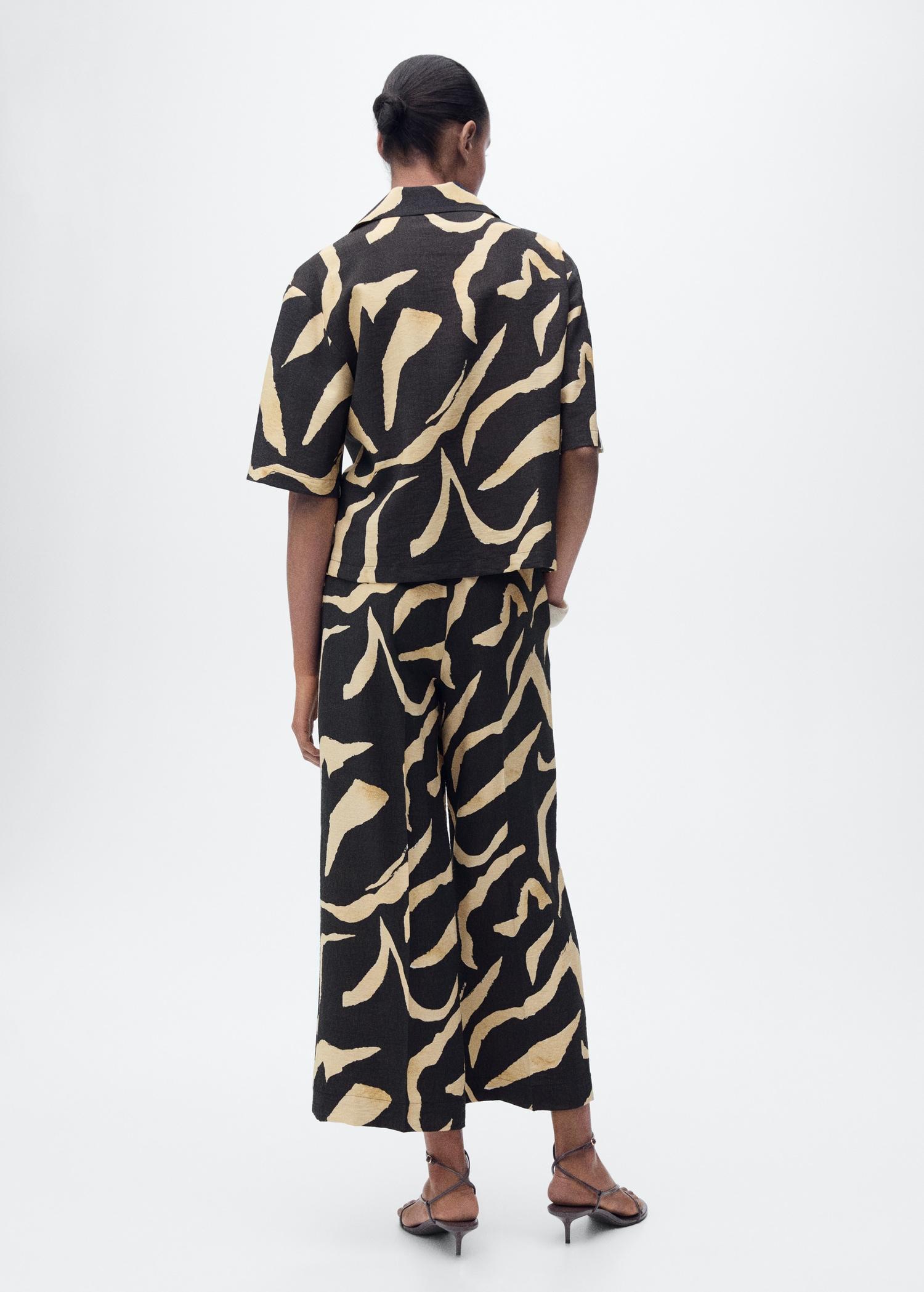 Printed straight-fit pants with belt - Women | MANGO USA Product Image