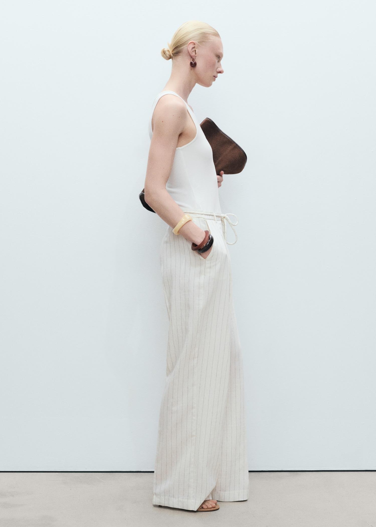 Striped combined knitted jumpsuit - Women | MANGO USA Product Image
