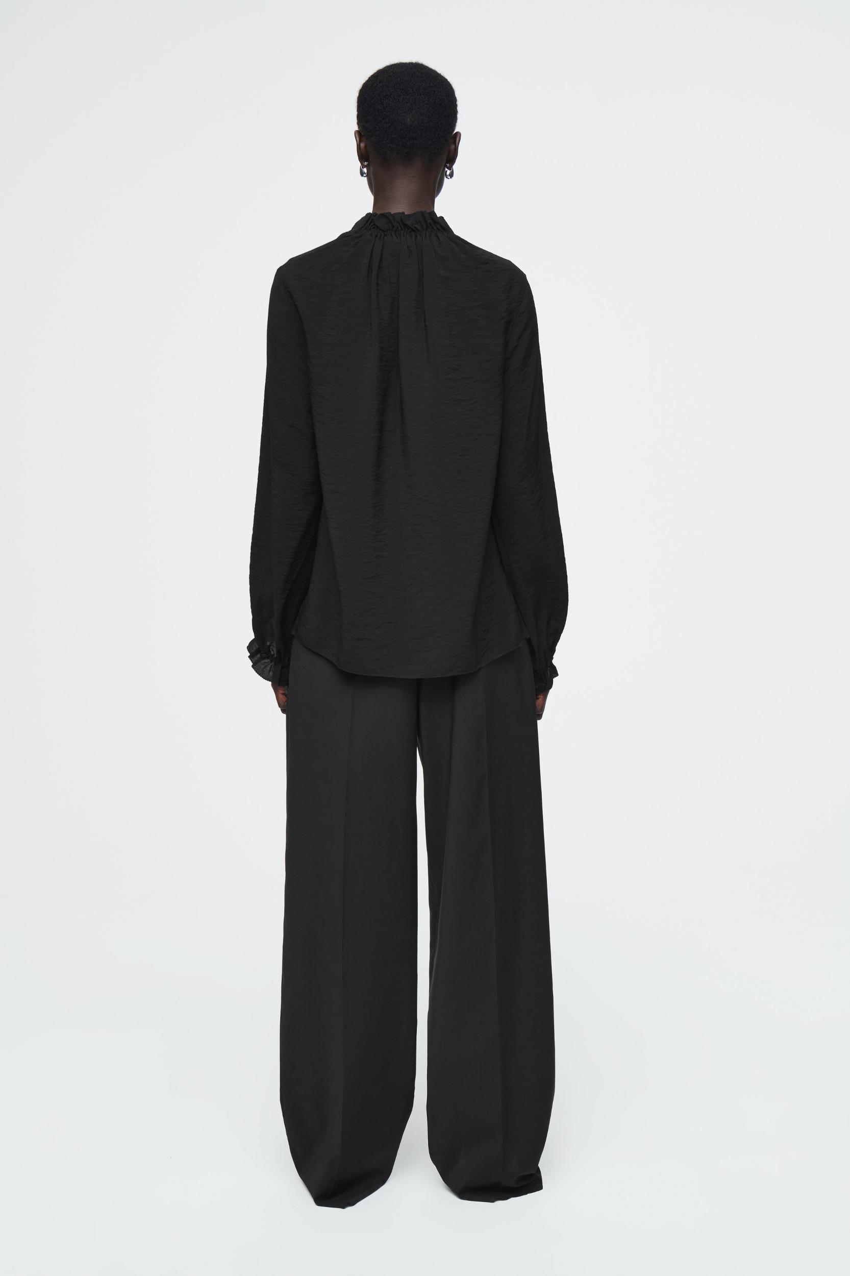 RUFFLED HIGH-NECK BLOUSE Product Image