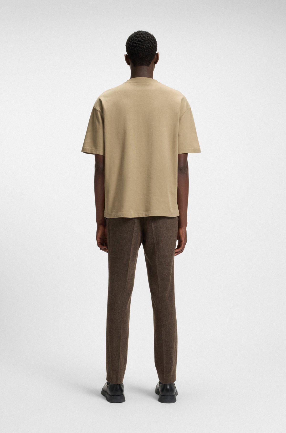 HUGO - Oversize-fit T-shirt in cotton with decorative reflective logo - Beige Product Image