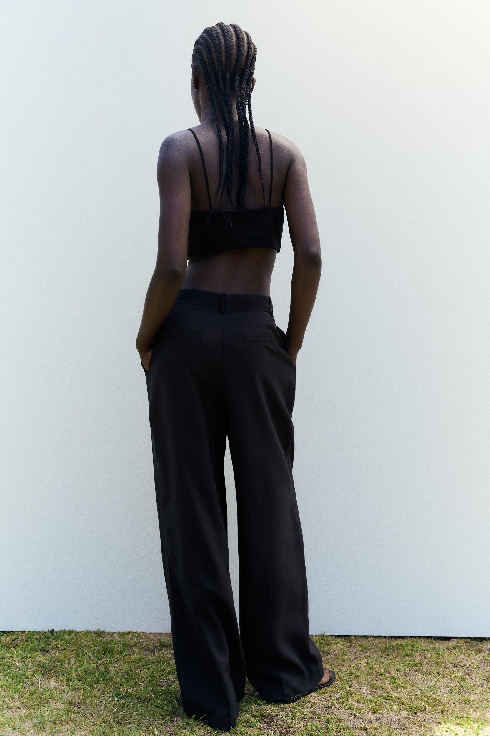 FLOWY PLEATED PANTS Product Image