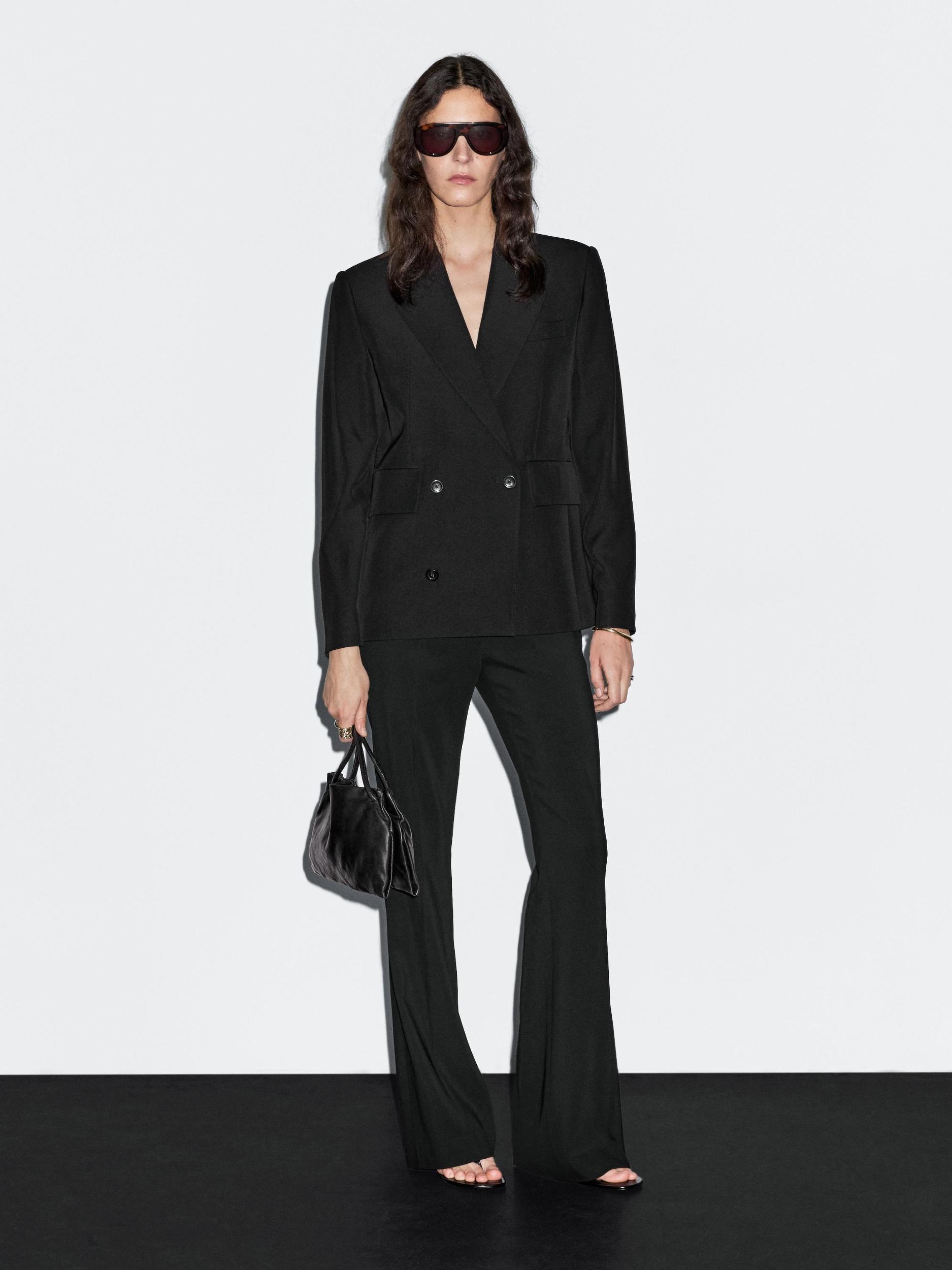 Flared trousers with pocket Product Image
