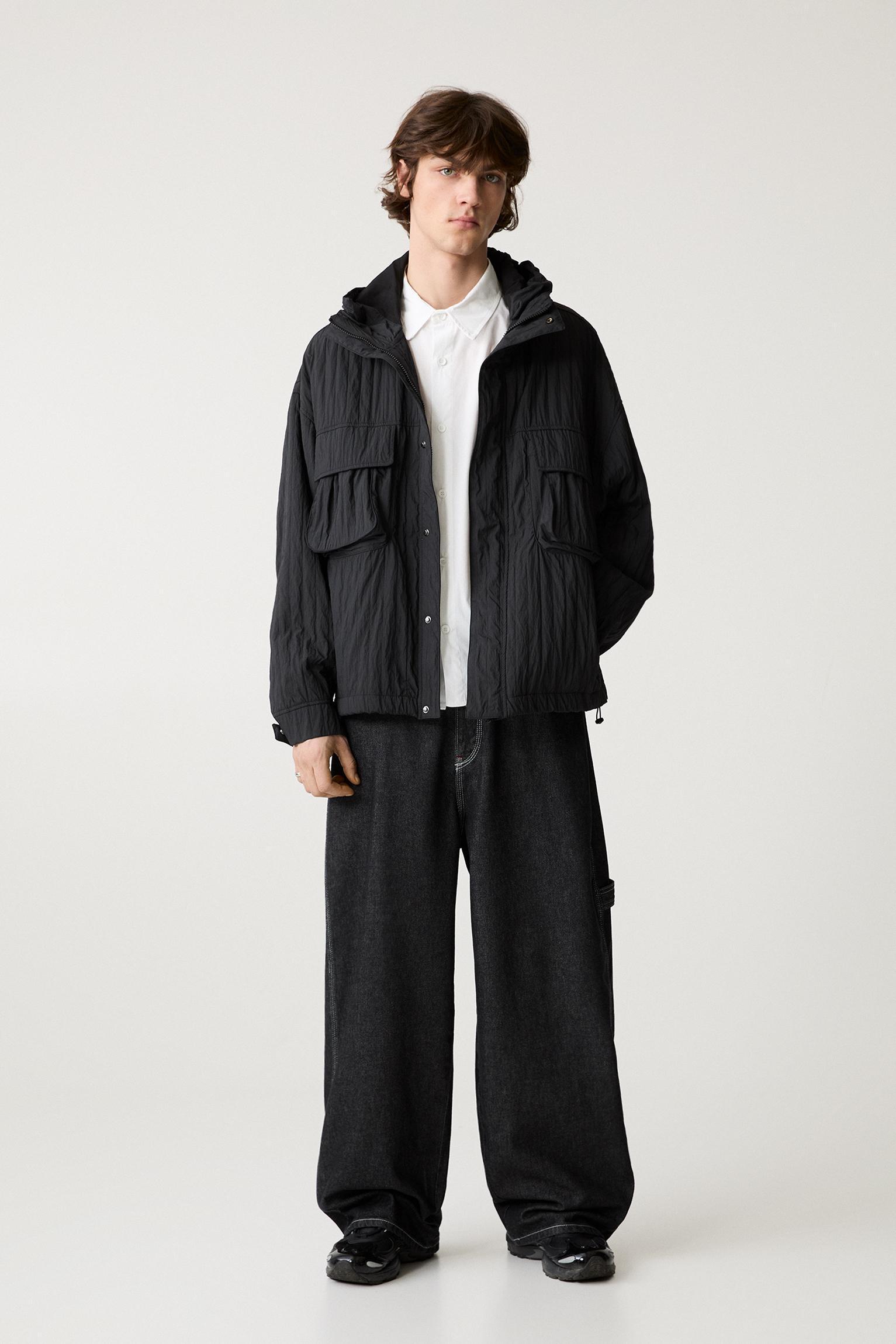 Creased raincoat with hood Product Image