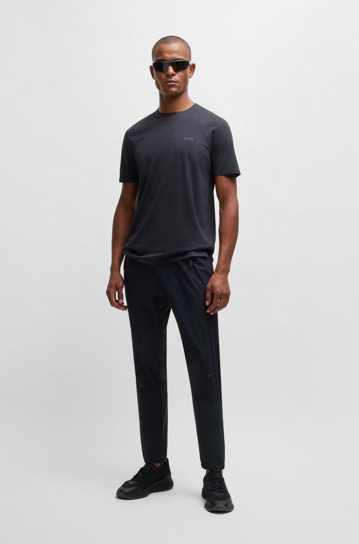 Regular-fit tracksuit bottoms with quick-dry performance Product Image