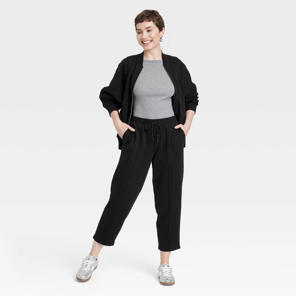 Womens Leisure Studio Mid-Rise Barrel Leg Sweatpants - Universal Thread Black S: Elastic Waistband Product Image