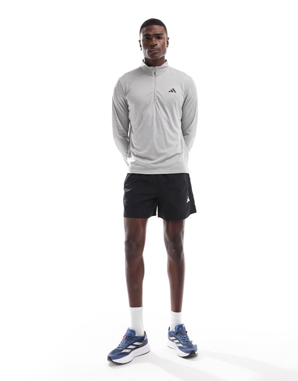 adidas Training Essentials quarter zip long sleeve T-shirt in gray Product Image