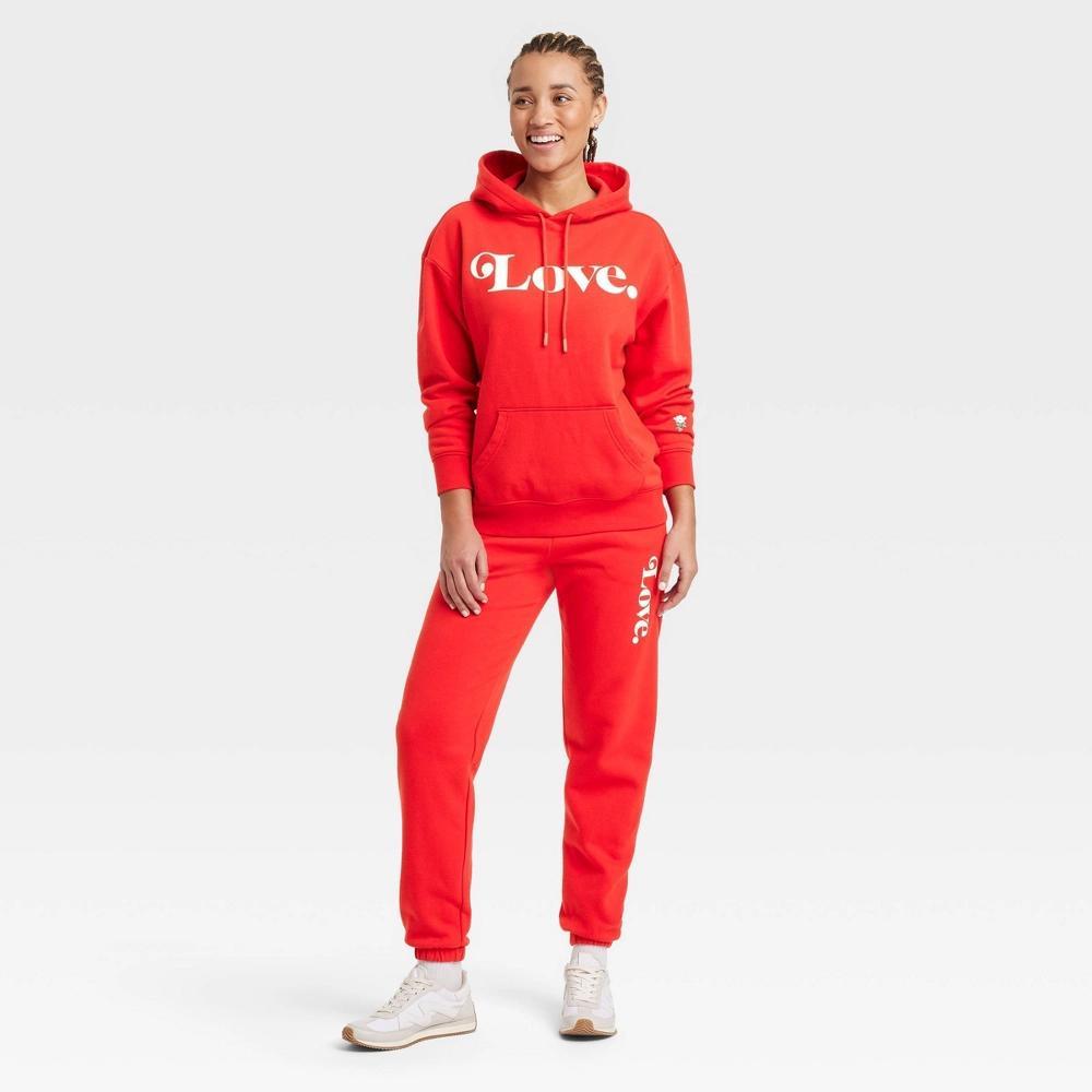 Women's Leisure Studio Graphic Hoodie Pullover Sweatshirt - Universal Thread™ Red XS Product Image