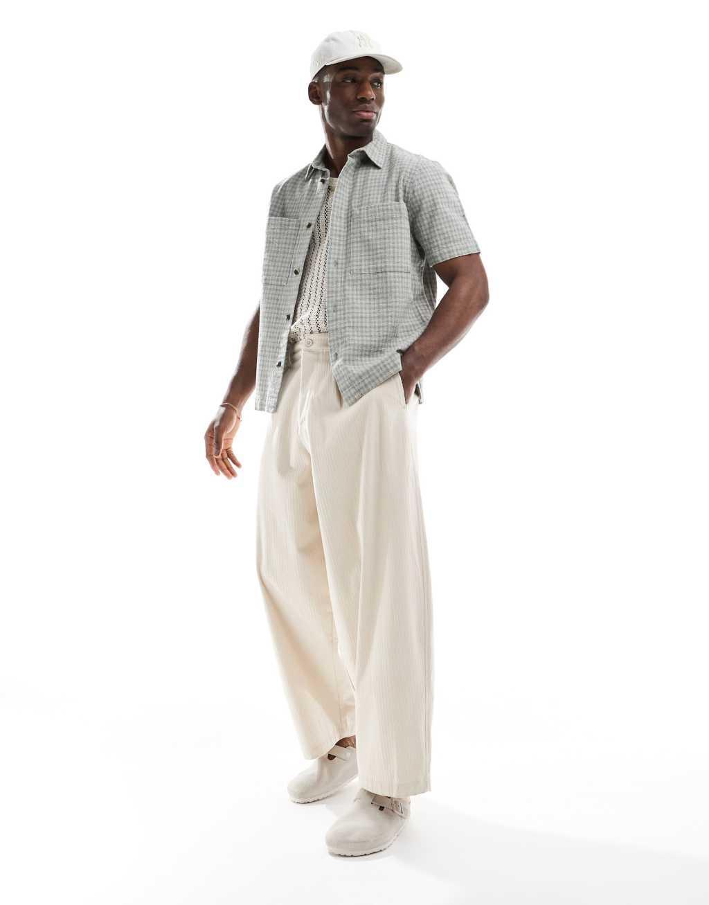 River Island short sleeve over shirt in muted plaid Product Image