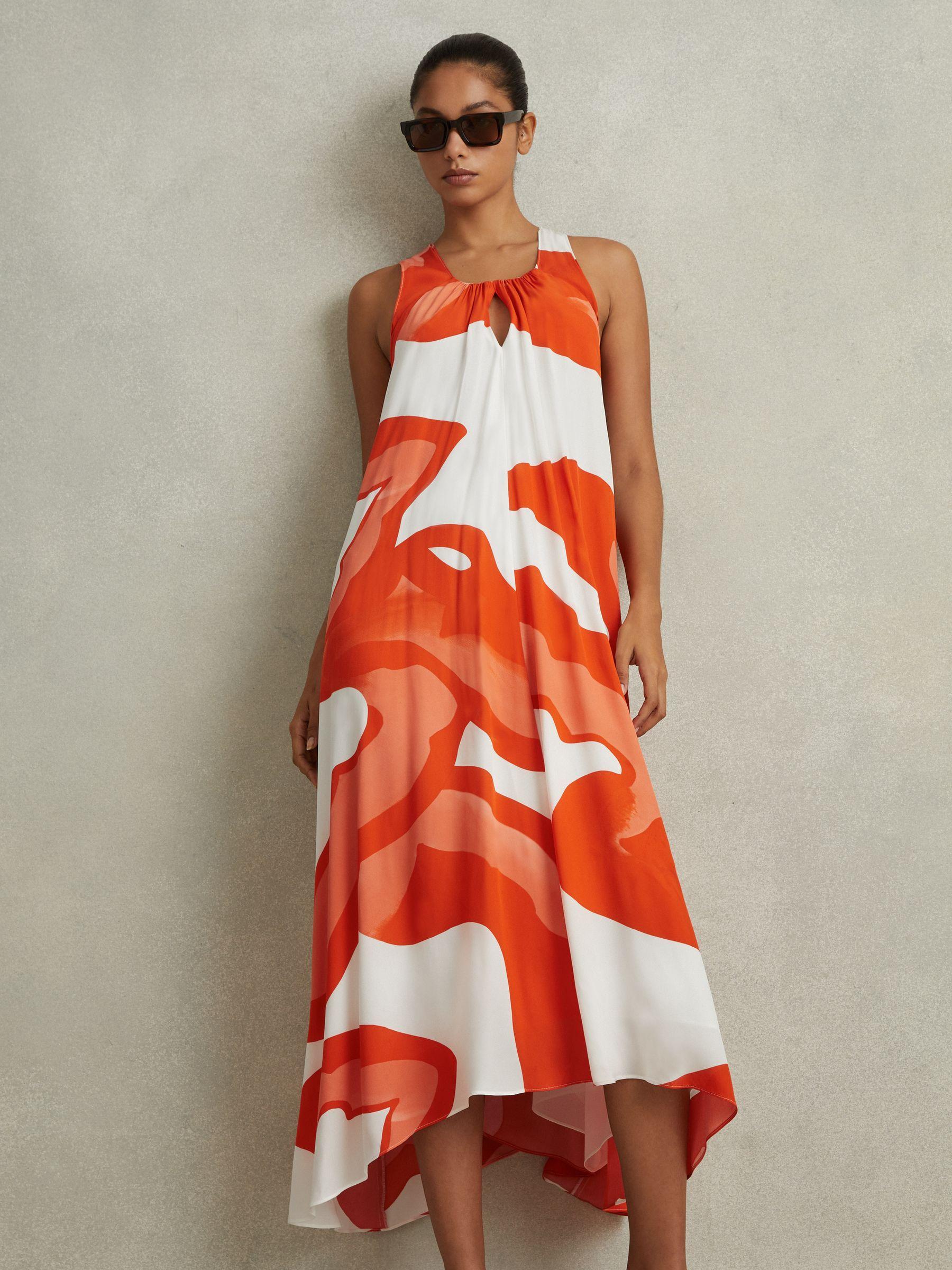 Printed Dipped Hem Midi Dress in Orange/White Product Image