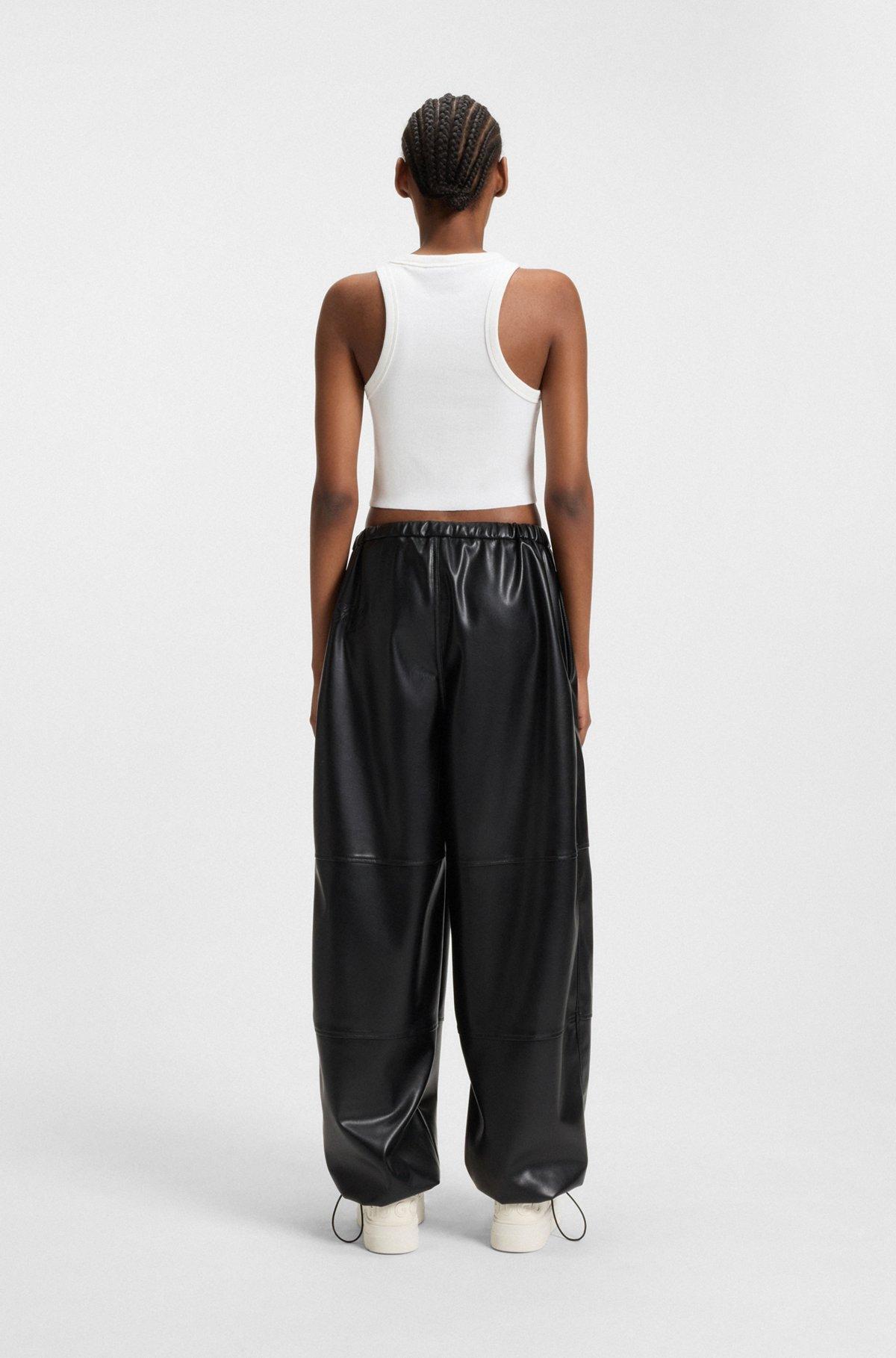 Tank top in ribbed stretch cotton with logo badge Product Image