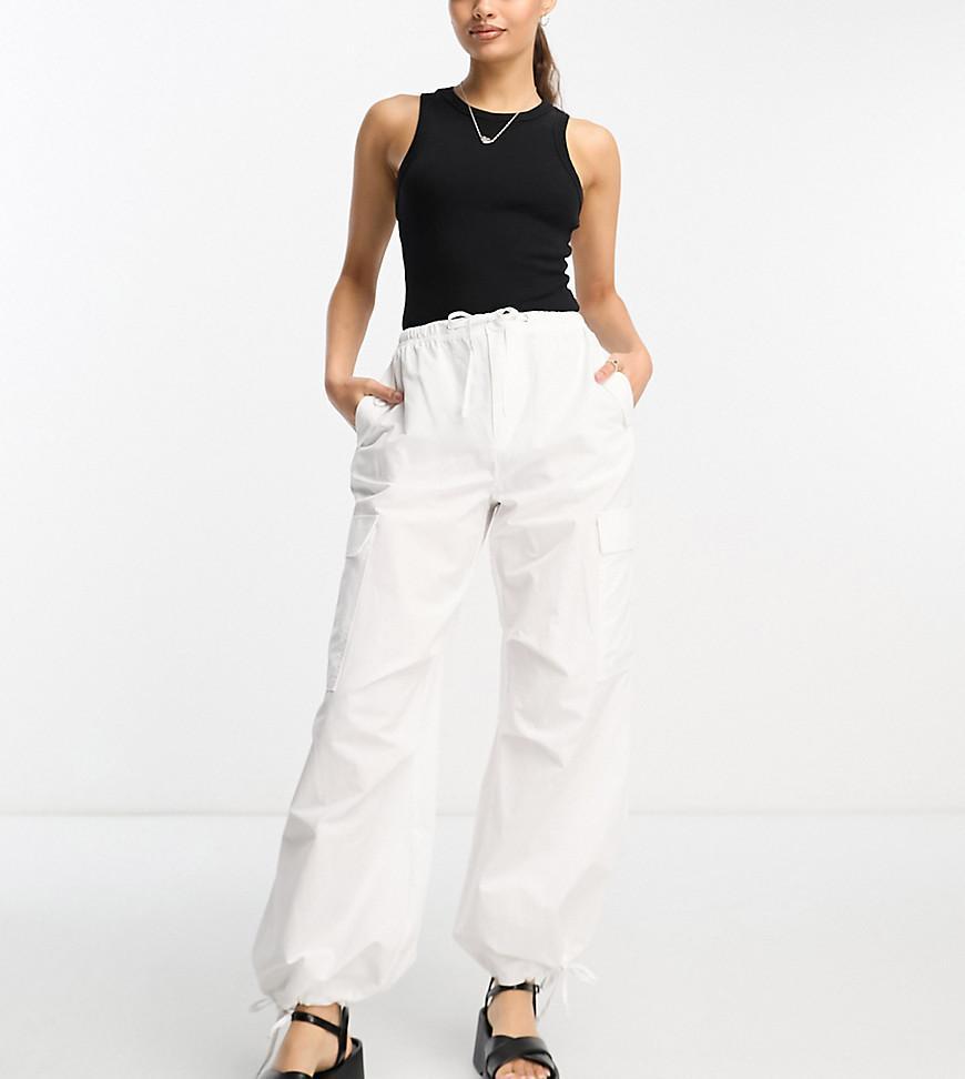 Bershka Petite tie waist nylon cargo parachute pants Product Image