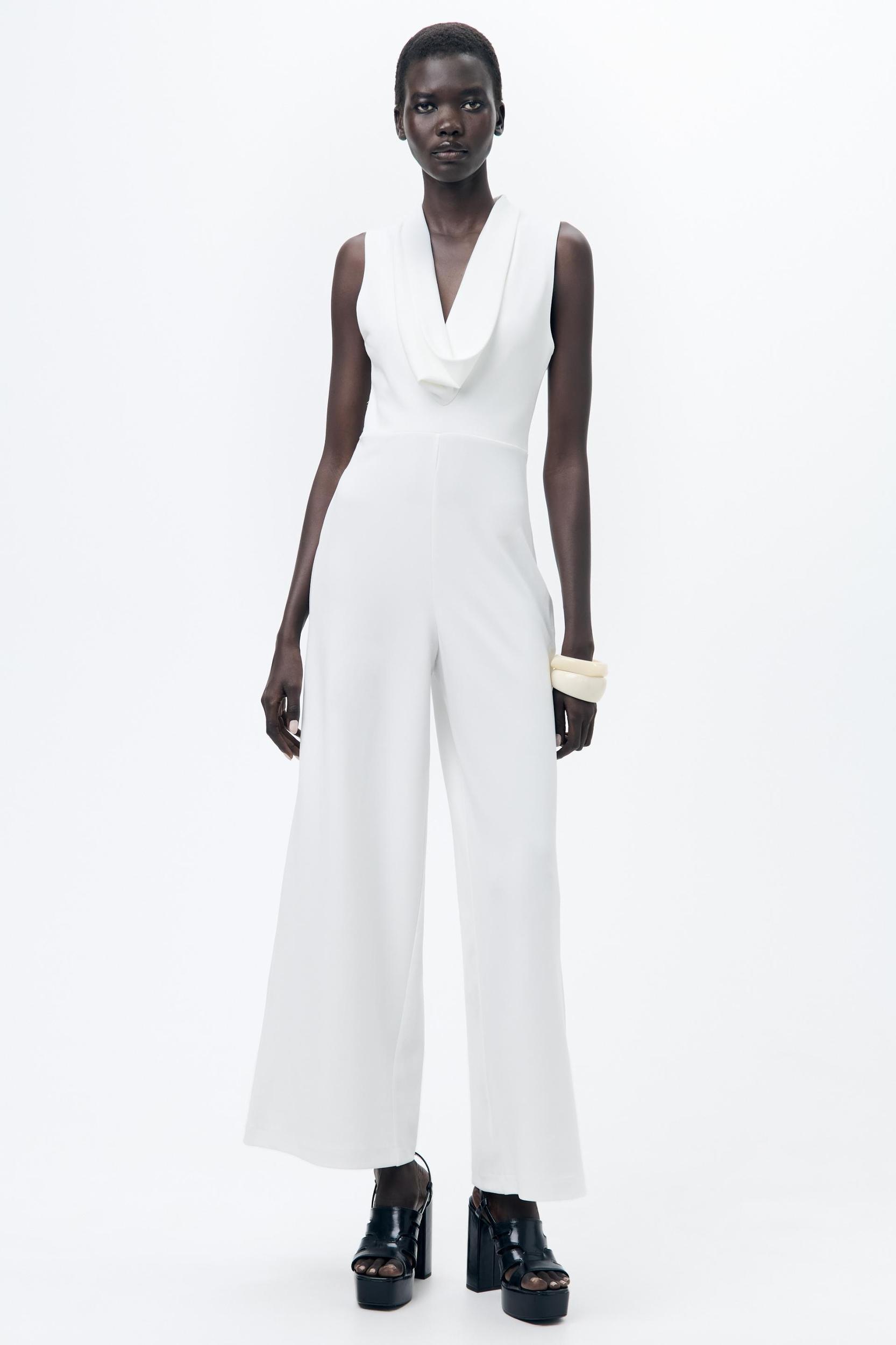FLOWY NECKLINE CREPE JUMPSUIT Product Image