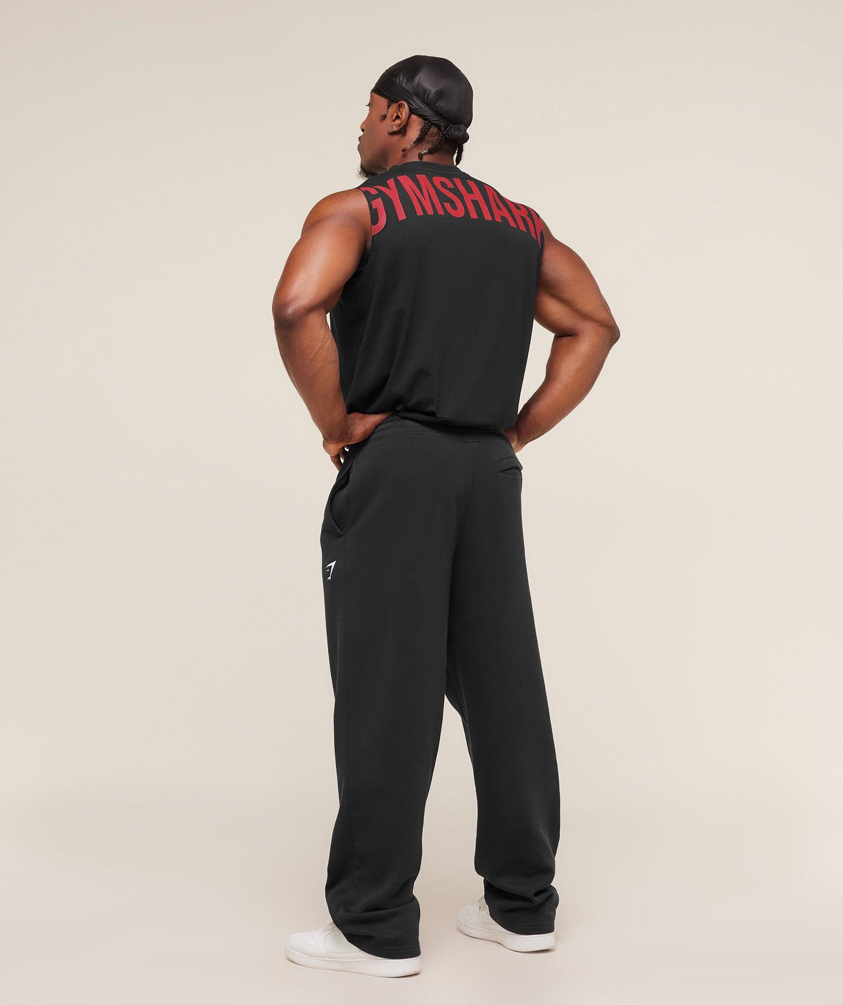 Gymshark Power Cut Off Tank - Black/Conditioning Red Male Product Image