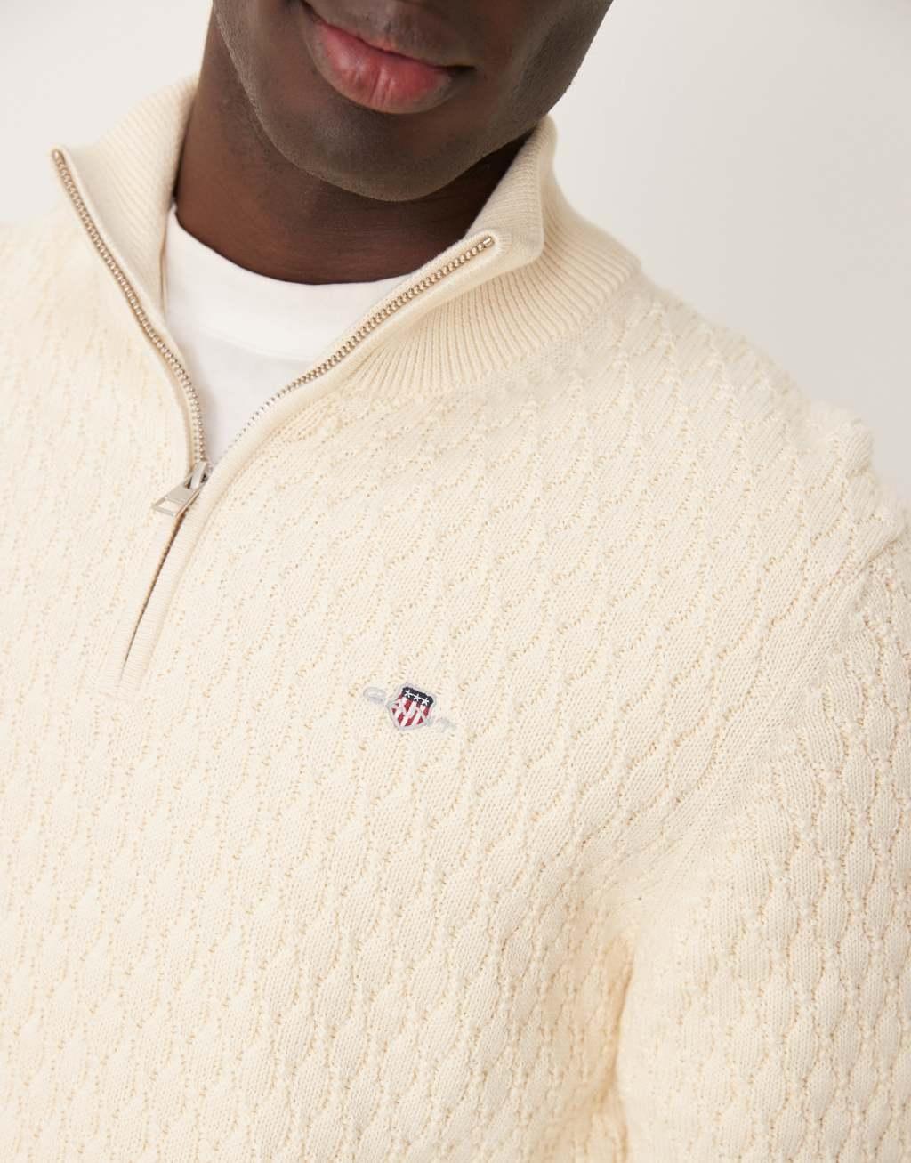 GANT shield logo cotton textured half zip knit sweater in cream Product Image