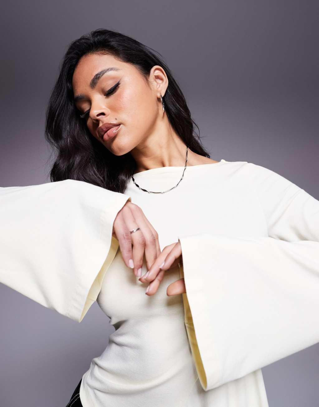 ASOS DESIGN angel sleeve top with godet detail in buttermilk Product Image