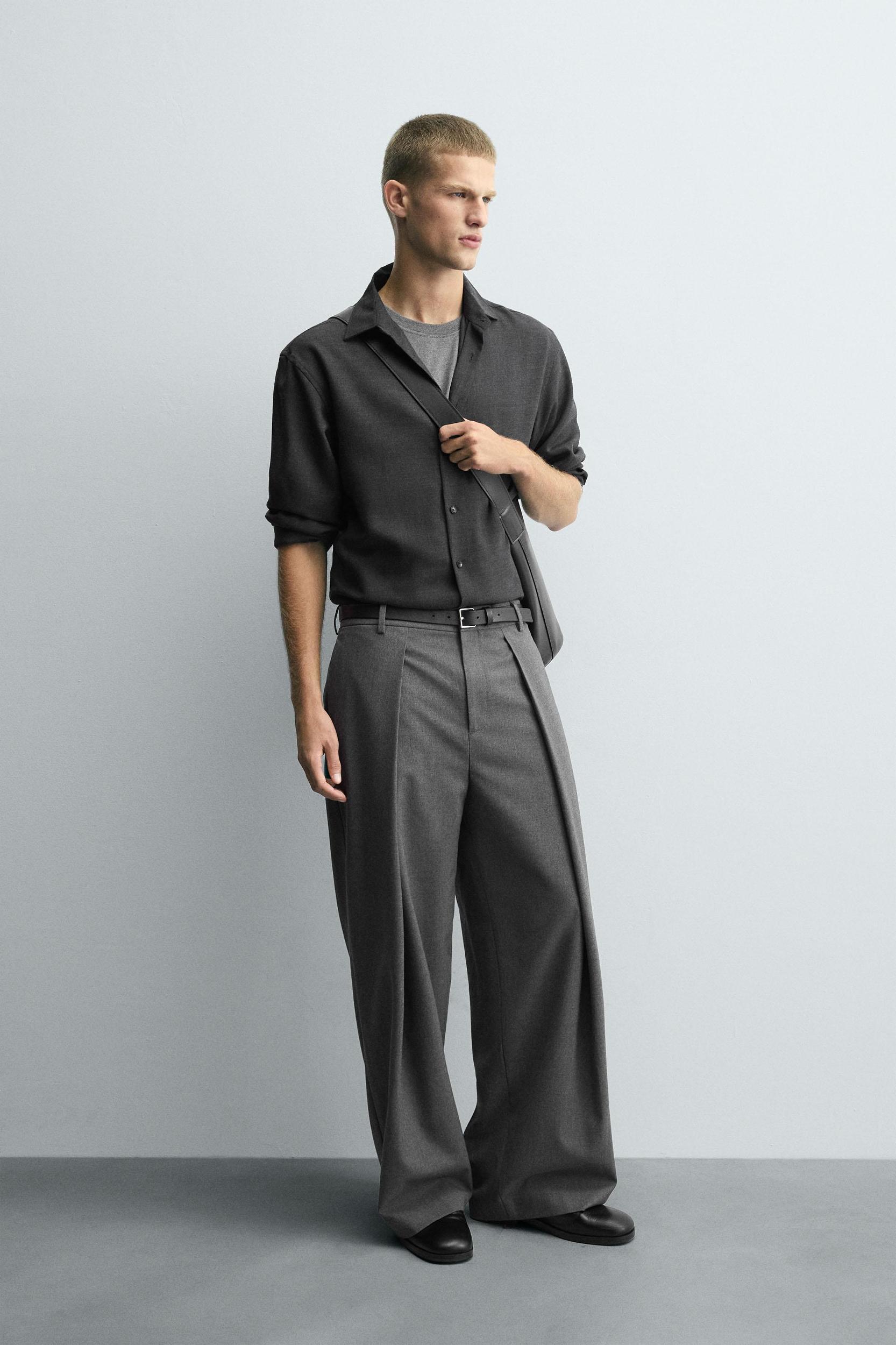 PLEATED WIDE FIT PANTS Product Image