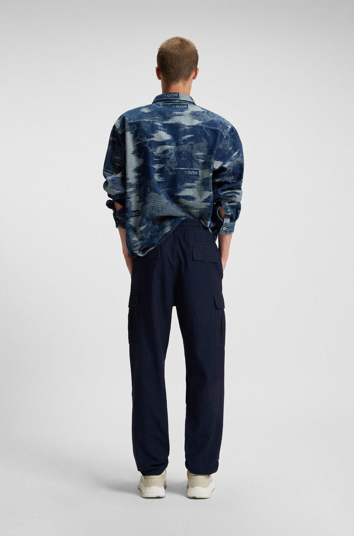 Relaxed-fit cargo trousers in denim-look ripstop Product Image