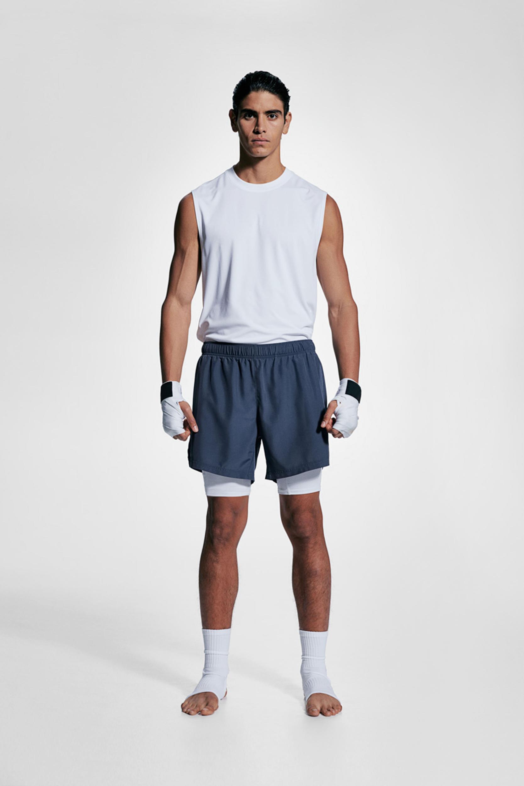 Double-Layered Sports Shorts with DryMove™ Product Image