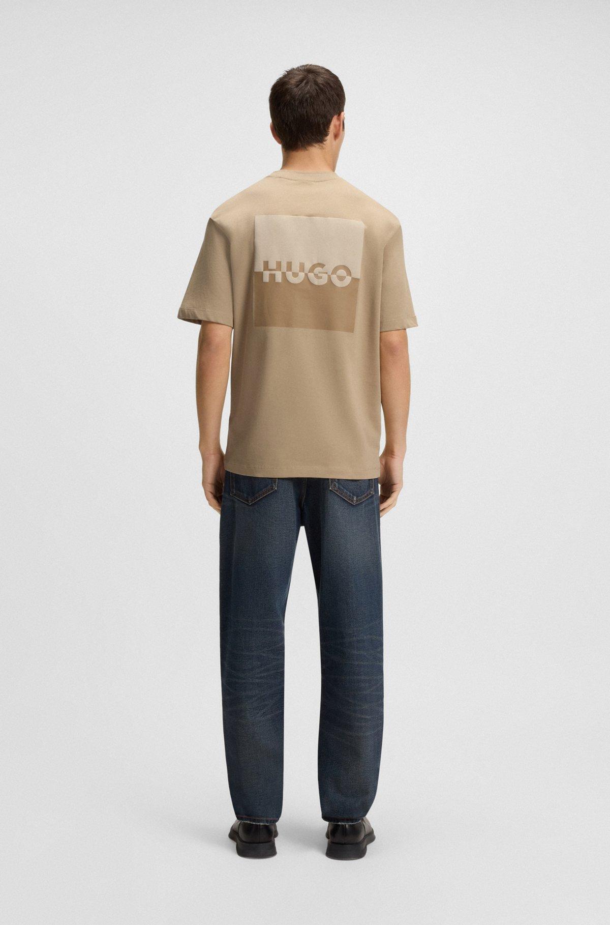 HUGO - Relaxed-fit T-shirt in cotton with split logos - Beige Product Image