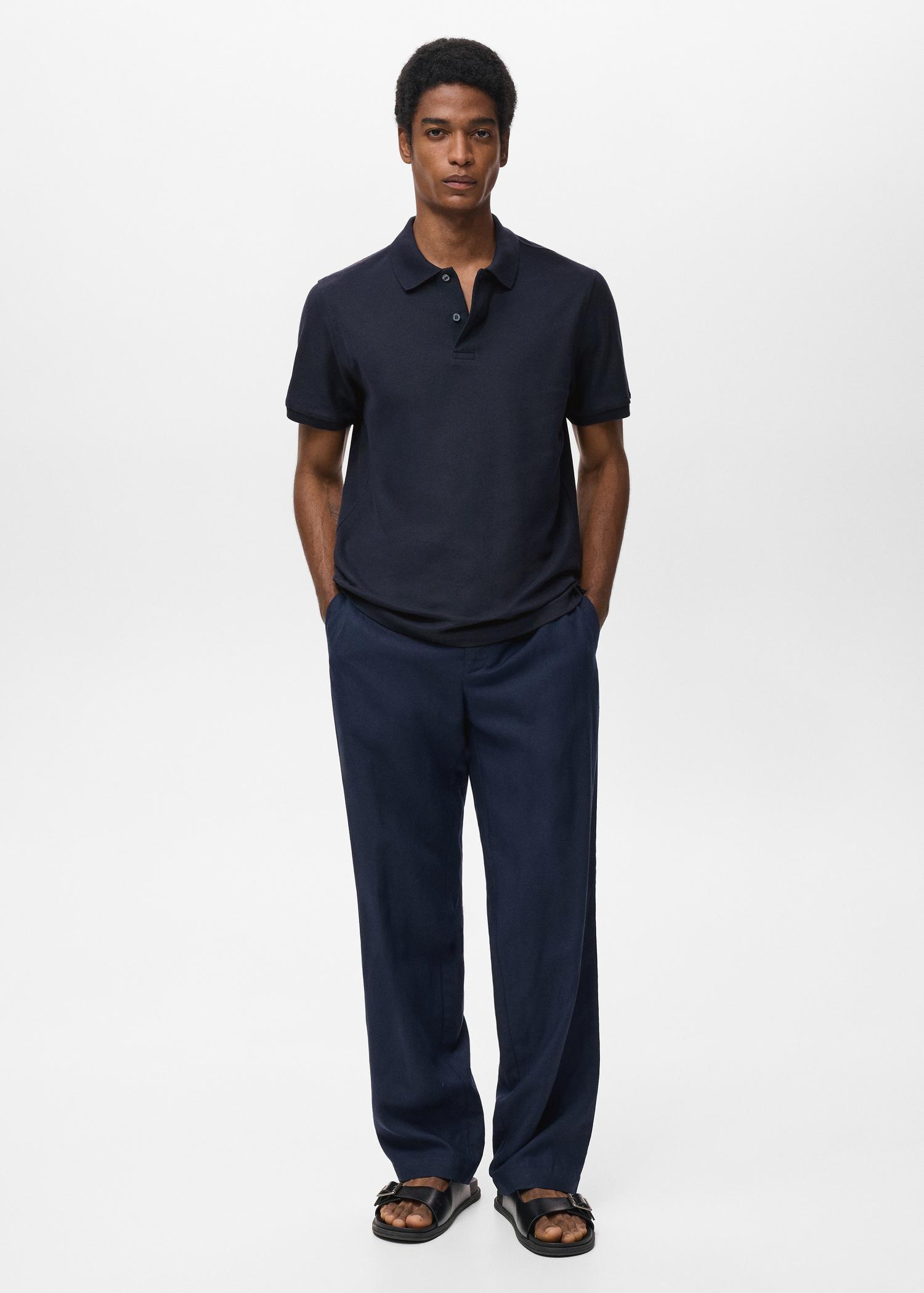 Regular-fit cotton piqué polo shirt - Men | MANGO USA Product Image