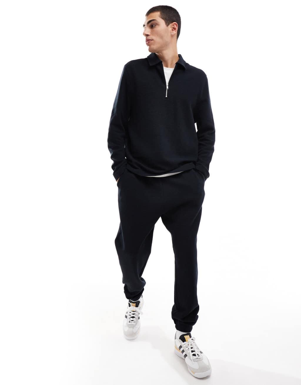 ASOS DESIGN quarter zip ribbed collar sweatshirt in black Product Image