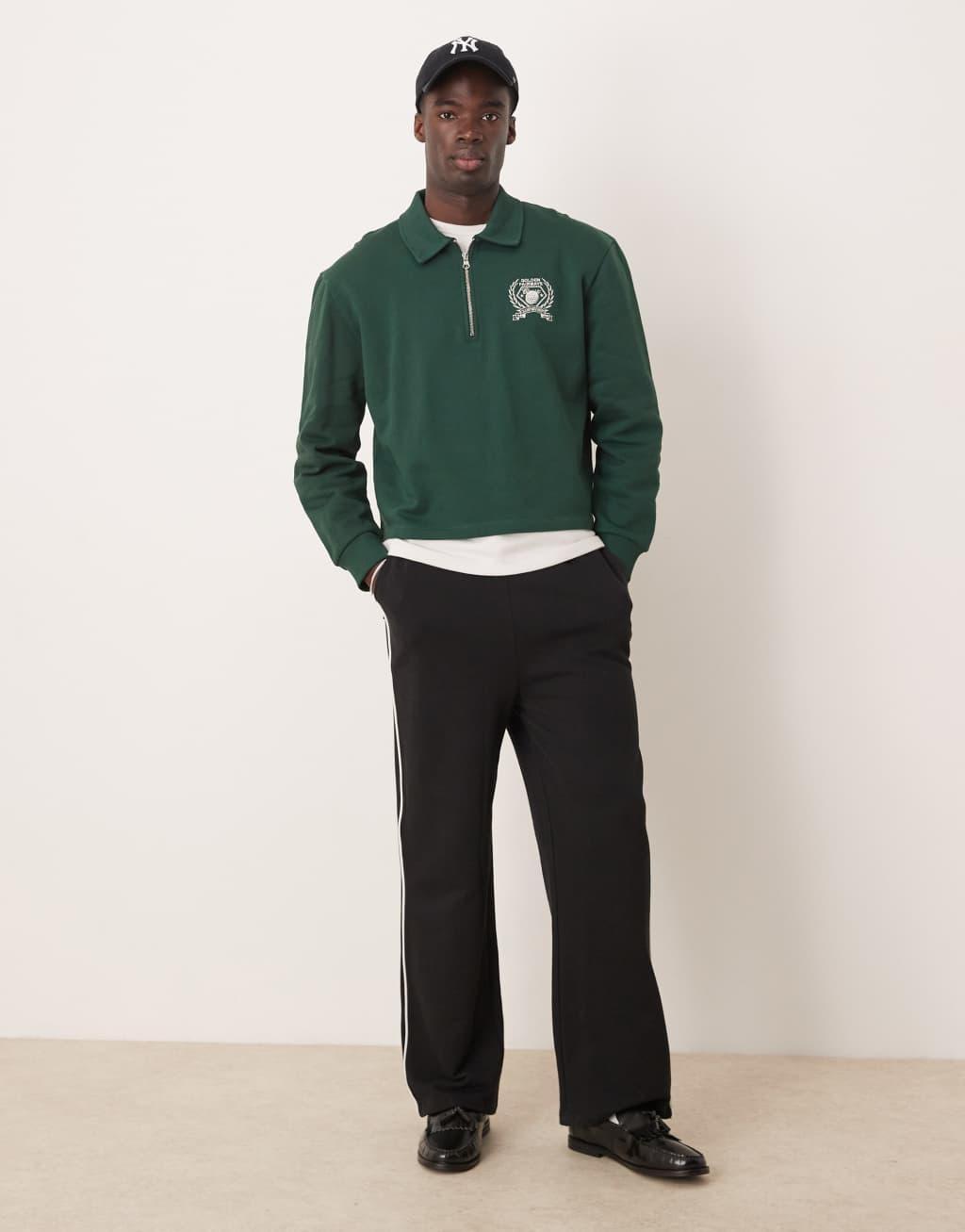 ASOS DESIGN boxy oversized polo shirt with tipping and embroidered chest print in green Product Image