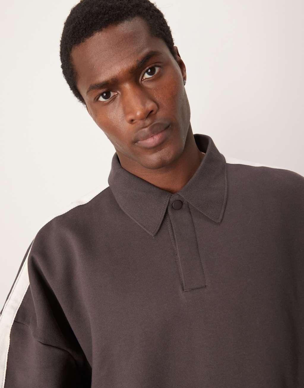 ASOS DESIGN heavyweight extreme oversized rugby sweatshirt with taping detail in dark brown Product Image