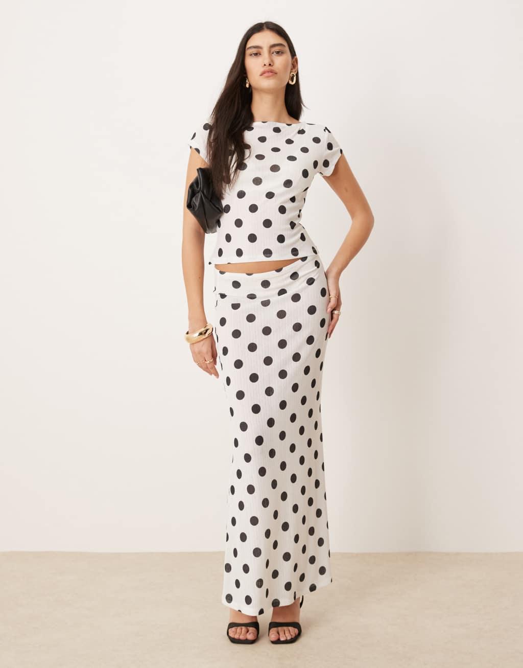 ASOS DESIGN polka dot dry handle rib slash neck top in white Product Image