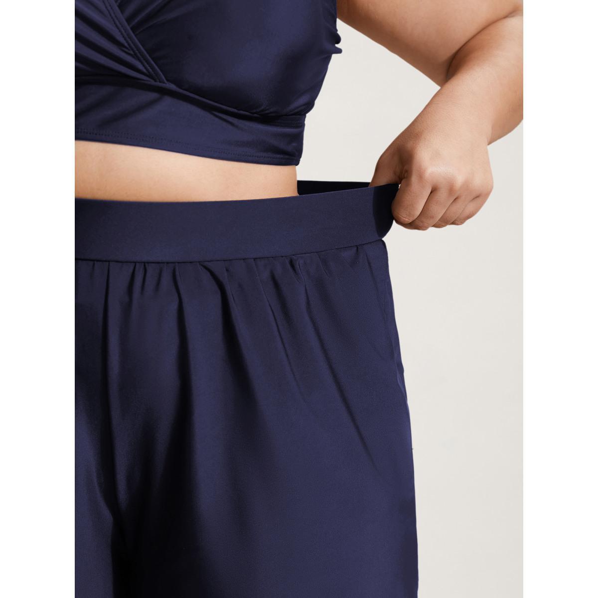 Plus Size High Waisted Pockets Solid Pleated Swim Bottom Women's Swimwear Indigo Beach Gathered High stretch Bodycon High Rise Slanted pocket Curve Swim Bottoms BloomChic 30/6X Product Image