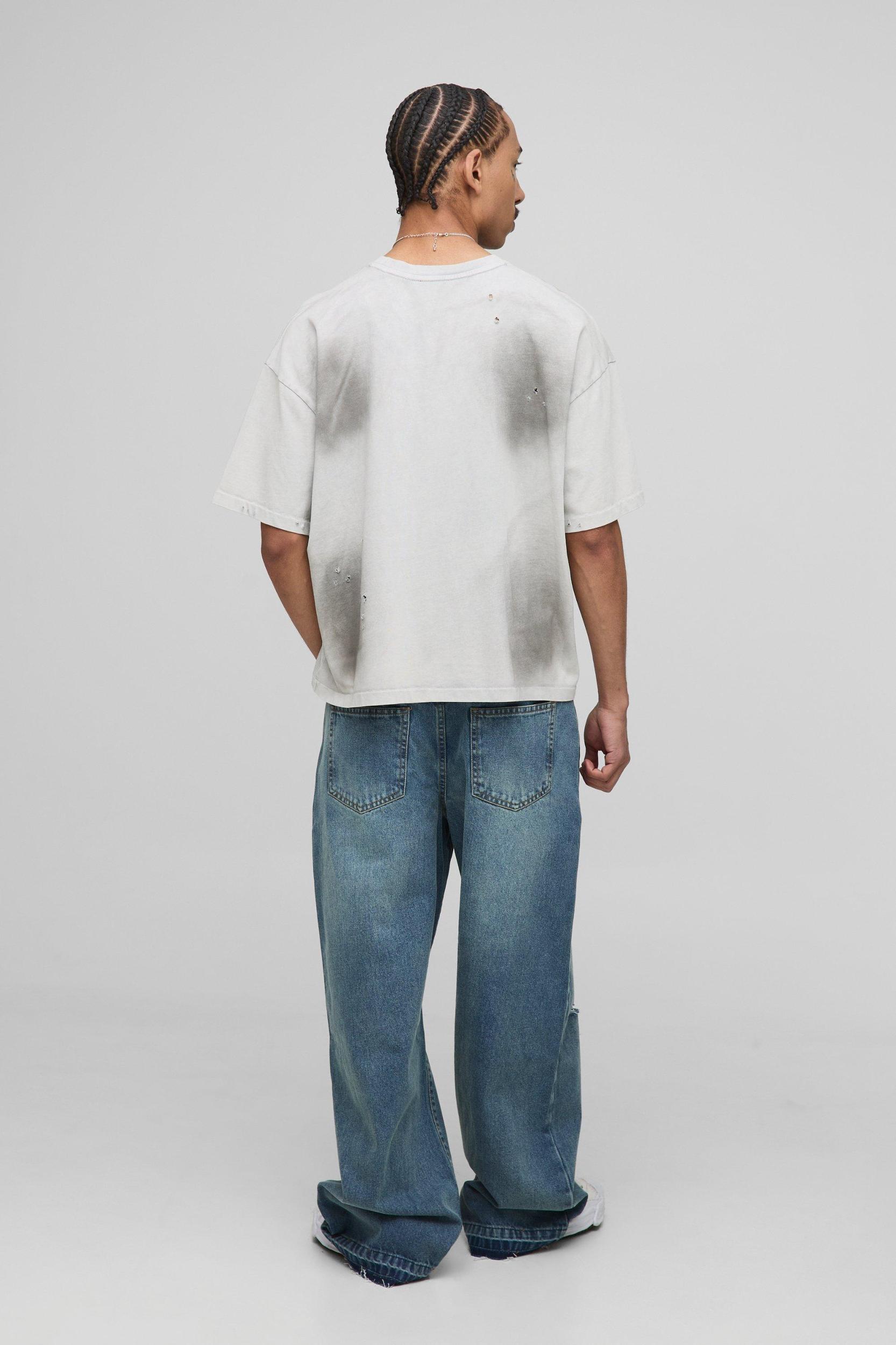 Wide Leg Ripped Knee Jeans With Let Down Hem | boohooMAN USA Product Image