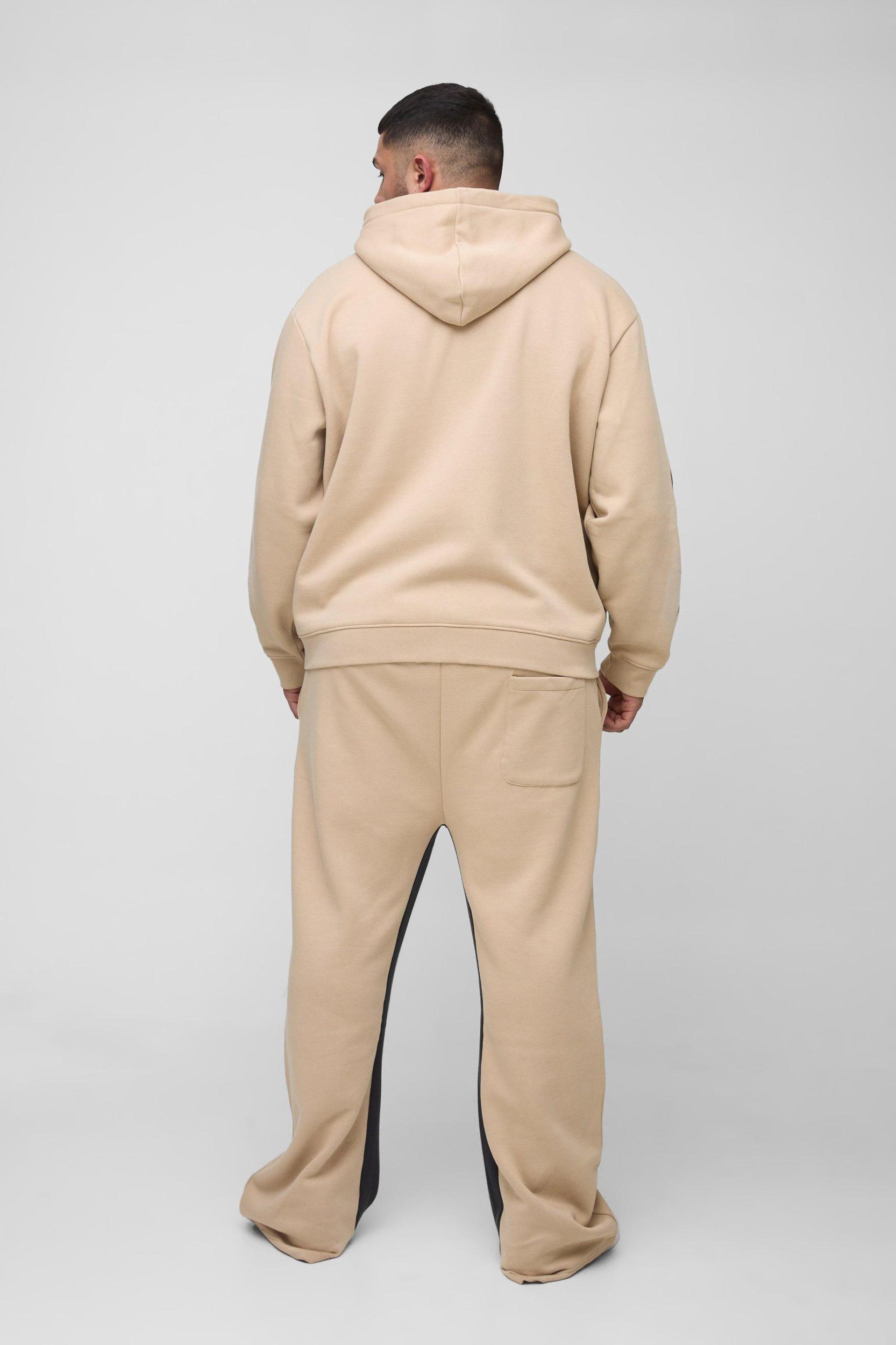 Plus Oversized Zip Thru Graphic Spray Wash Hooded Relaxed Flare Tracksuit | boohooMAN USA Product Image
