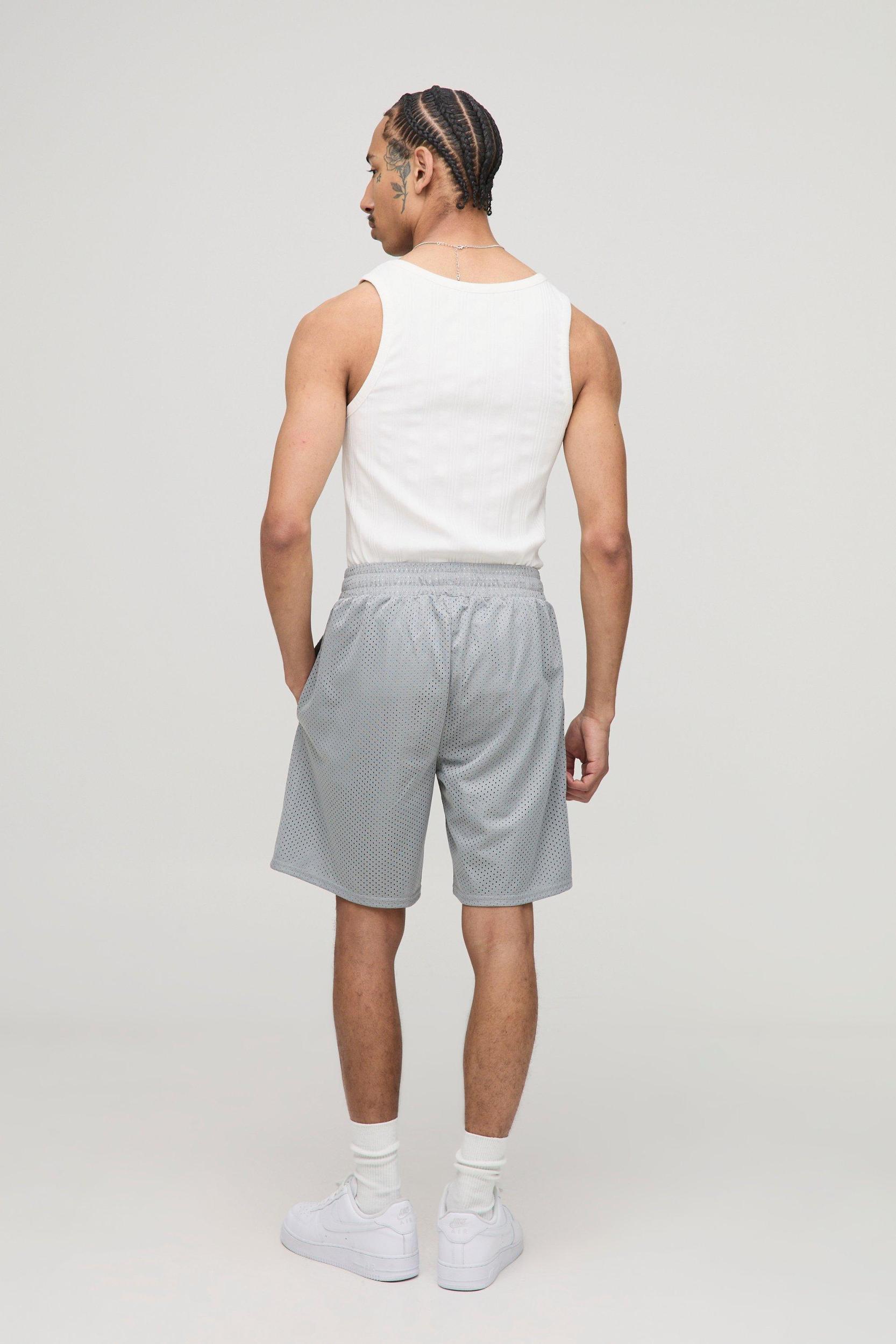 Varsity Graphic Mid Length Mesh Basketball Shorts | boohooMAN USA Product Image