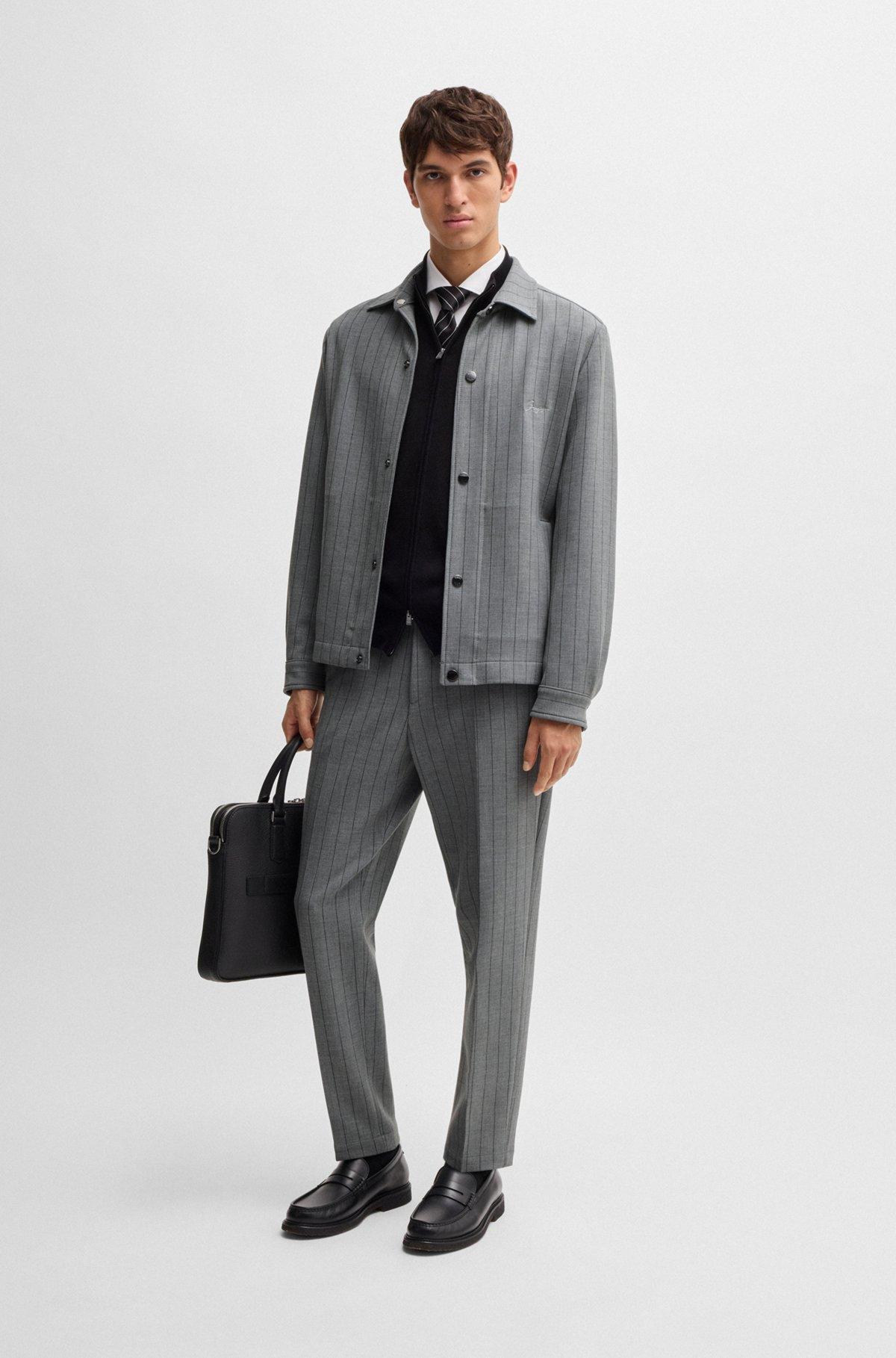 Tapered-fit trousers in pinstripe stretch fabric Product Image