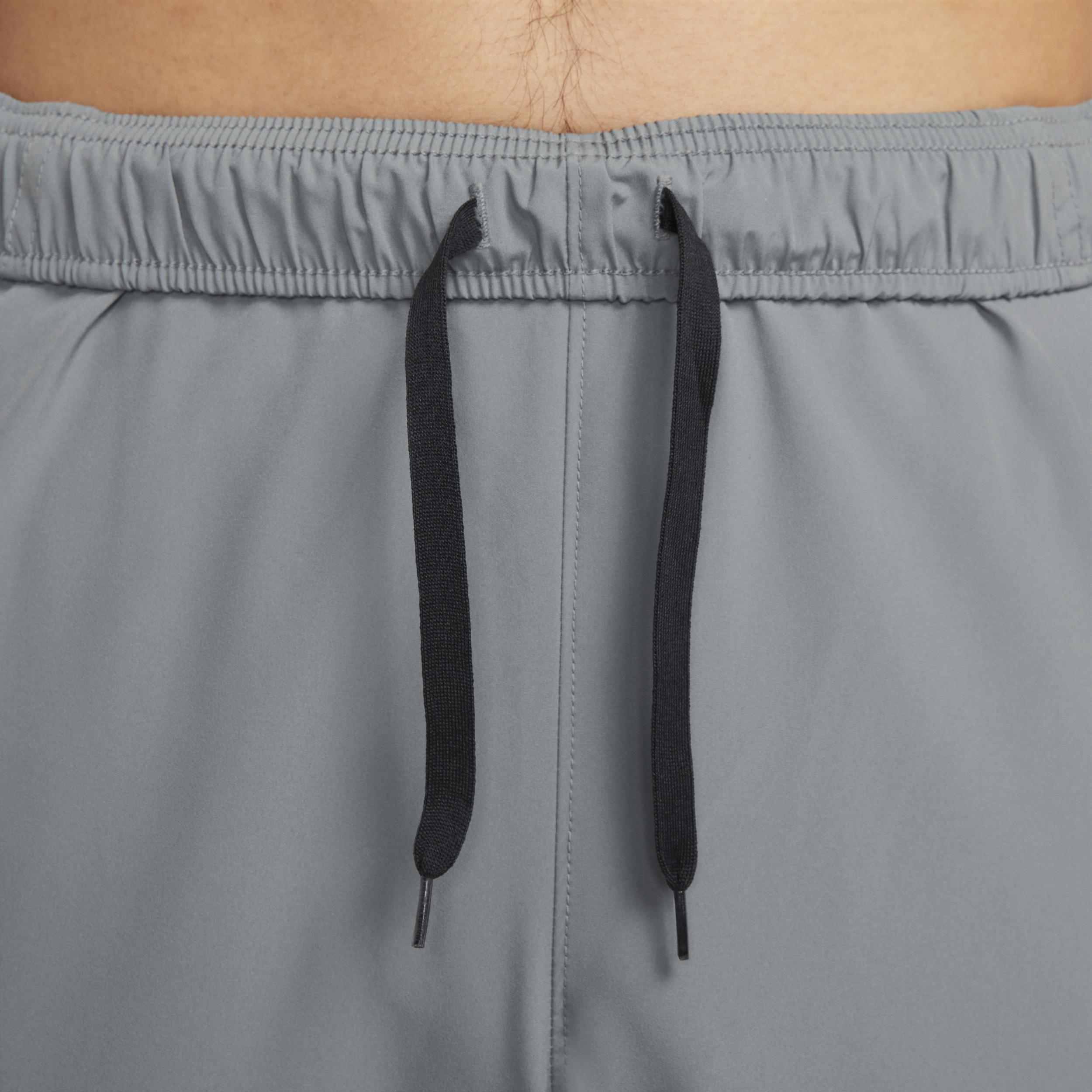 Nike Men's Form Dri-FIT Tapered Versatile Pants in Grey/Smoke Grey Size Large 100% Polyester Product Image