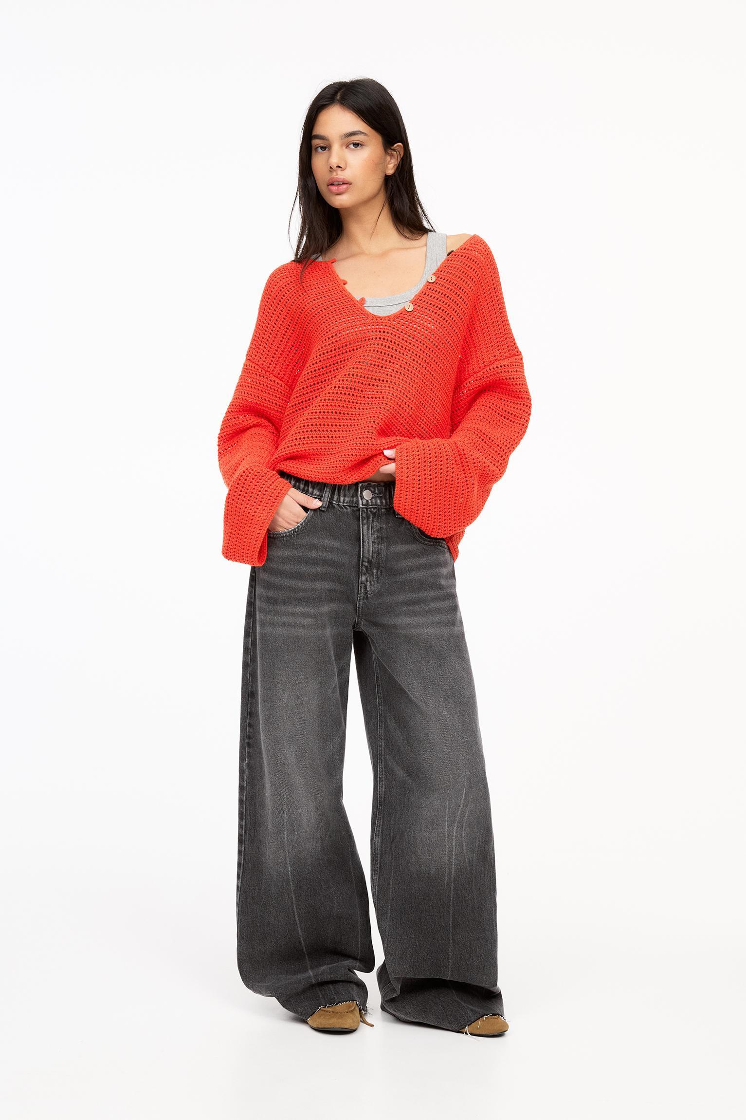 Open knit sweater with buttons Product Image