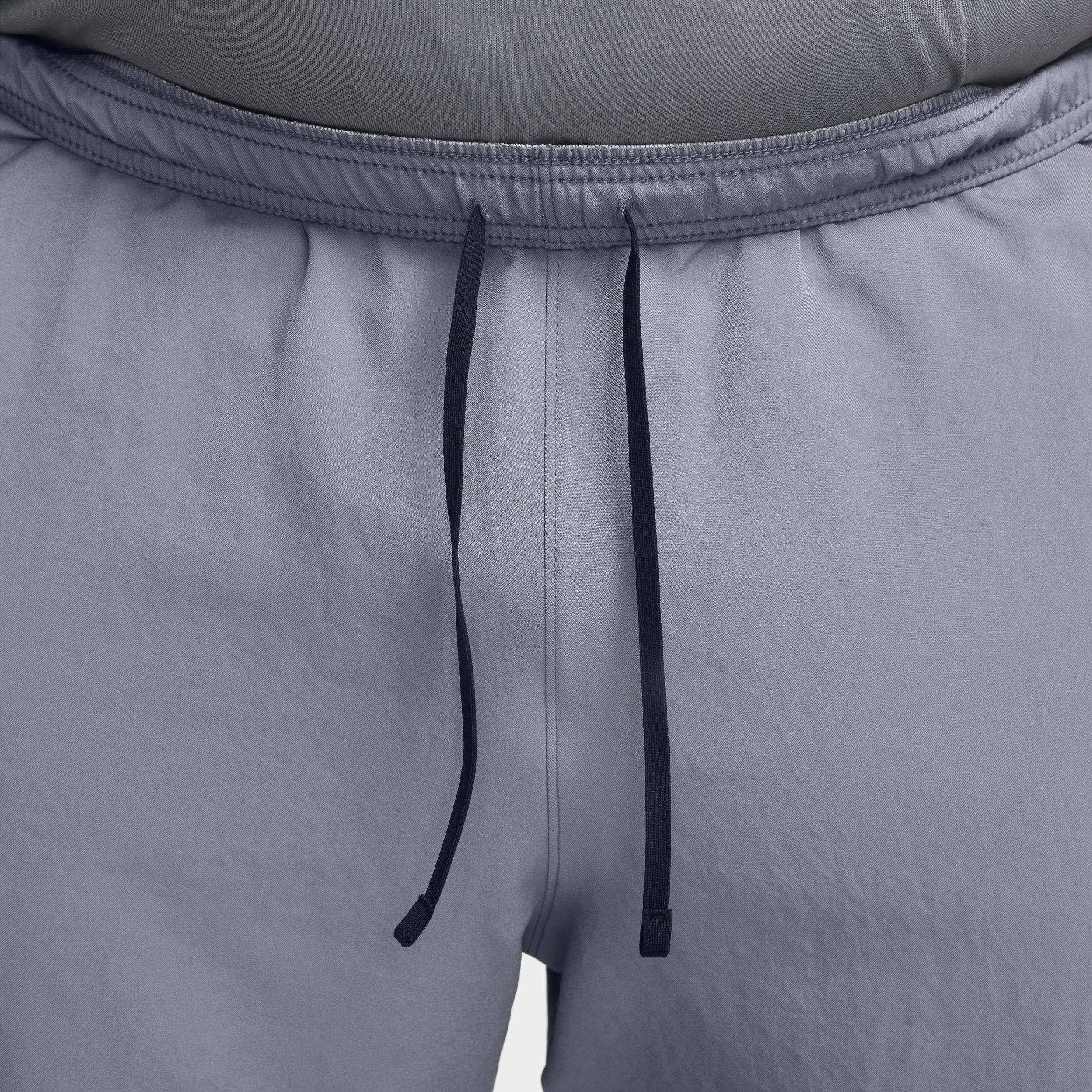 Nike Men's Challenger Dri-FIT Woven Running Pants in Grey/Smoke Grey Size Medium Polyester Product Image