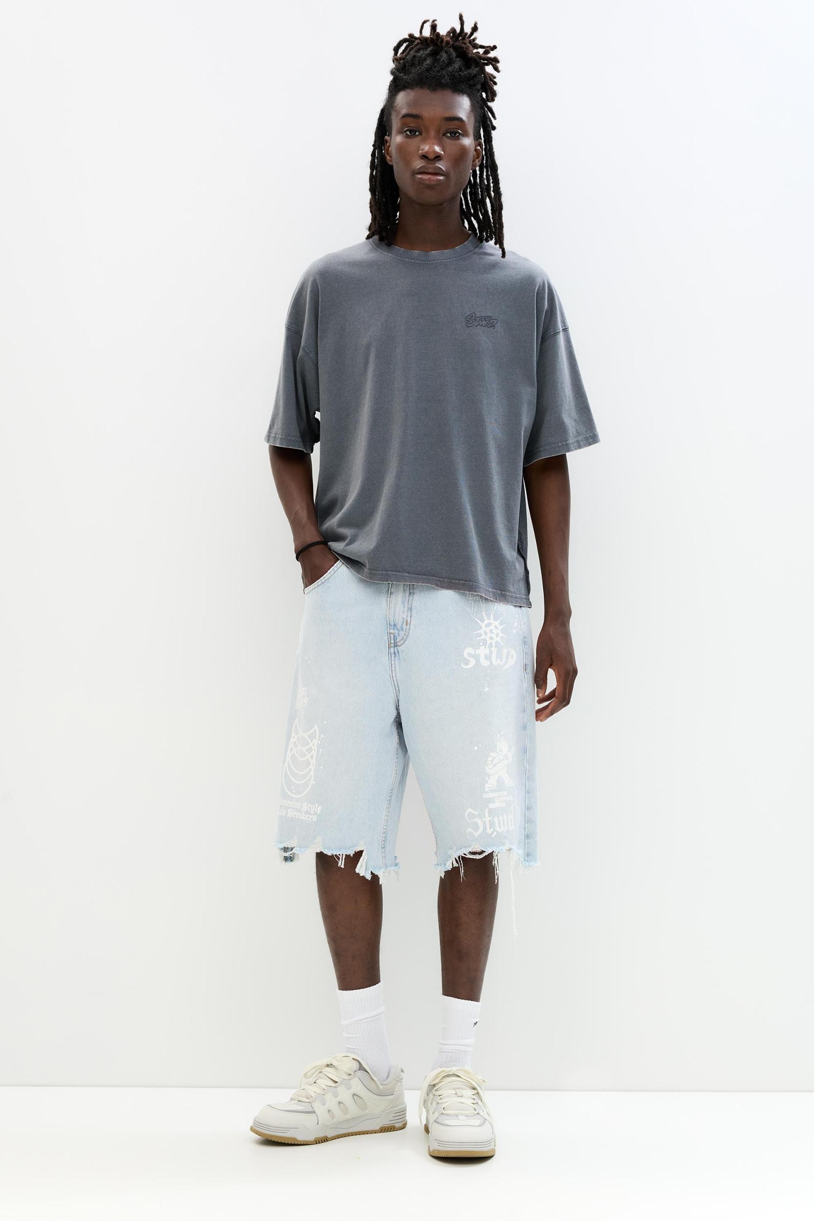Ripped denim Bermuda shorts Product Image