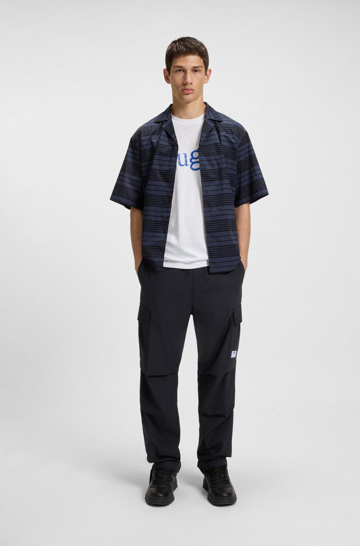 HUGO - Stretch-cotton T-shirt with graphic logo print - White Product Image