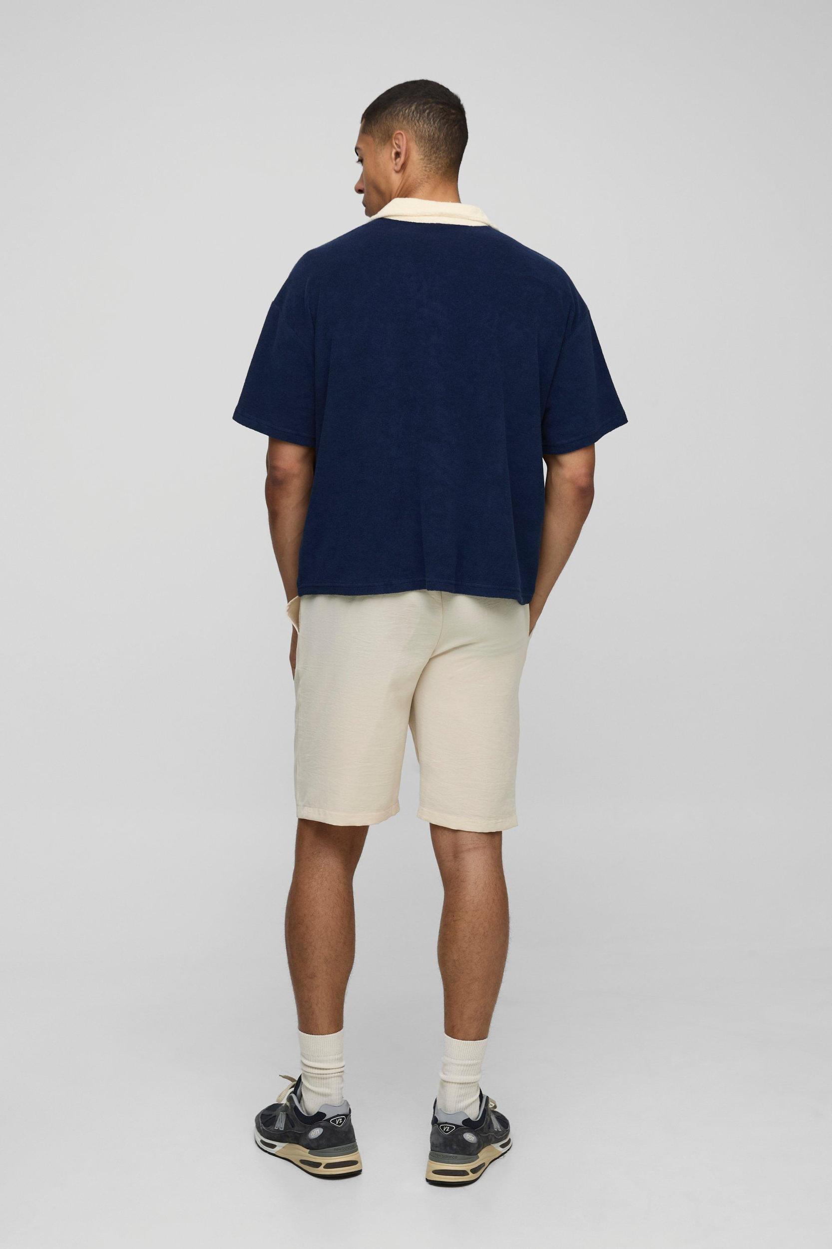 Boxy Contrast Collar Towelling V Neck Polo | boohooMAN USA Product Image