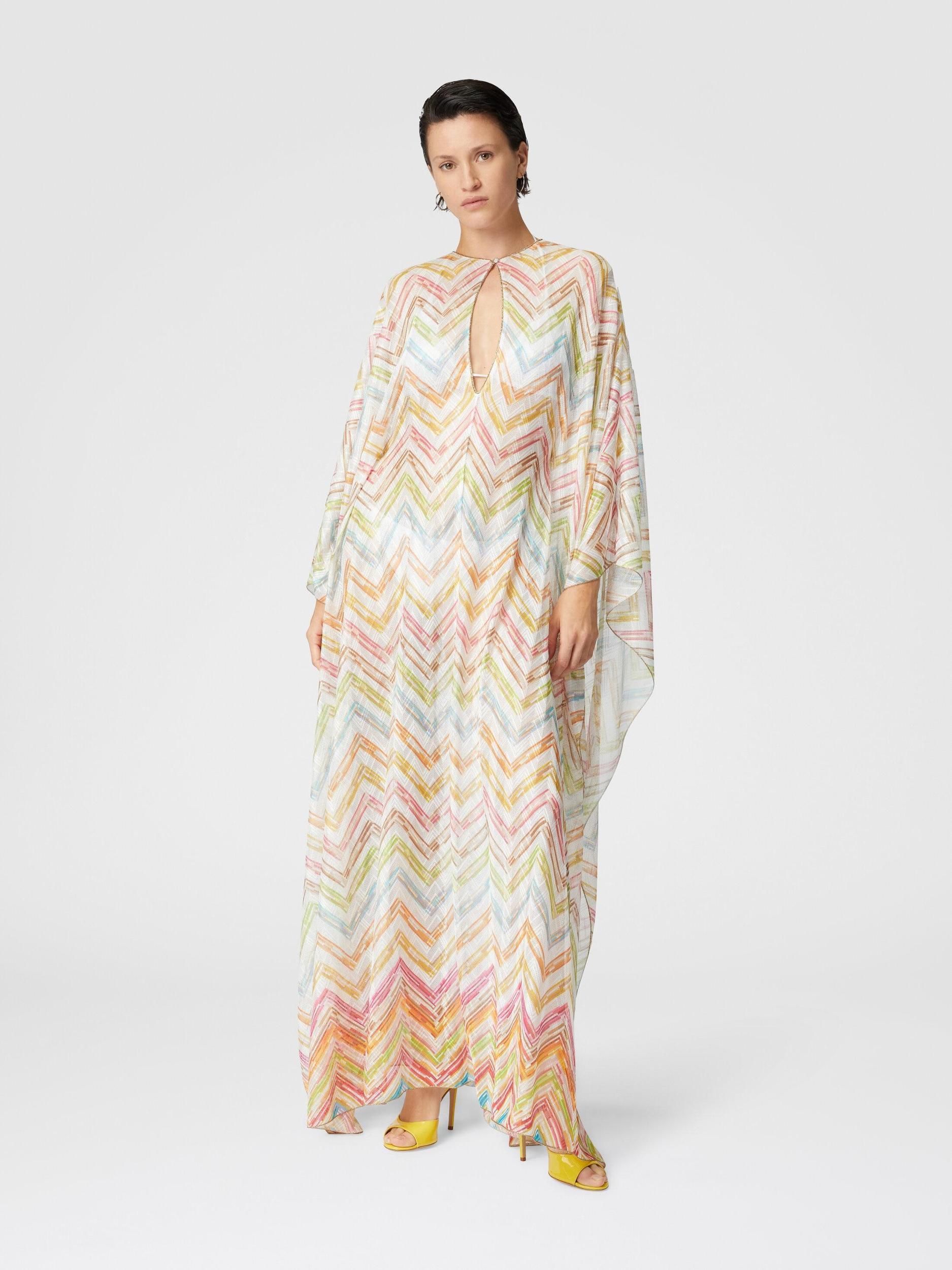 Long covered up in printed tulle with batwing sleeves Product Image