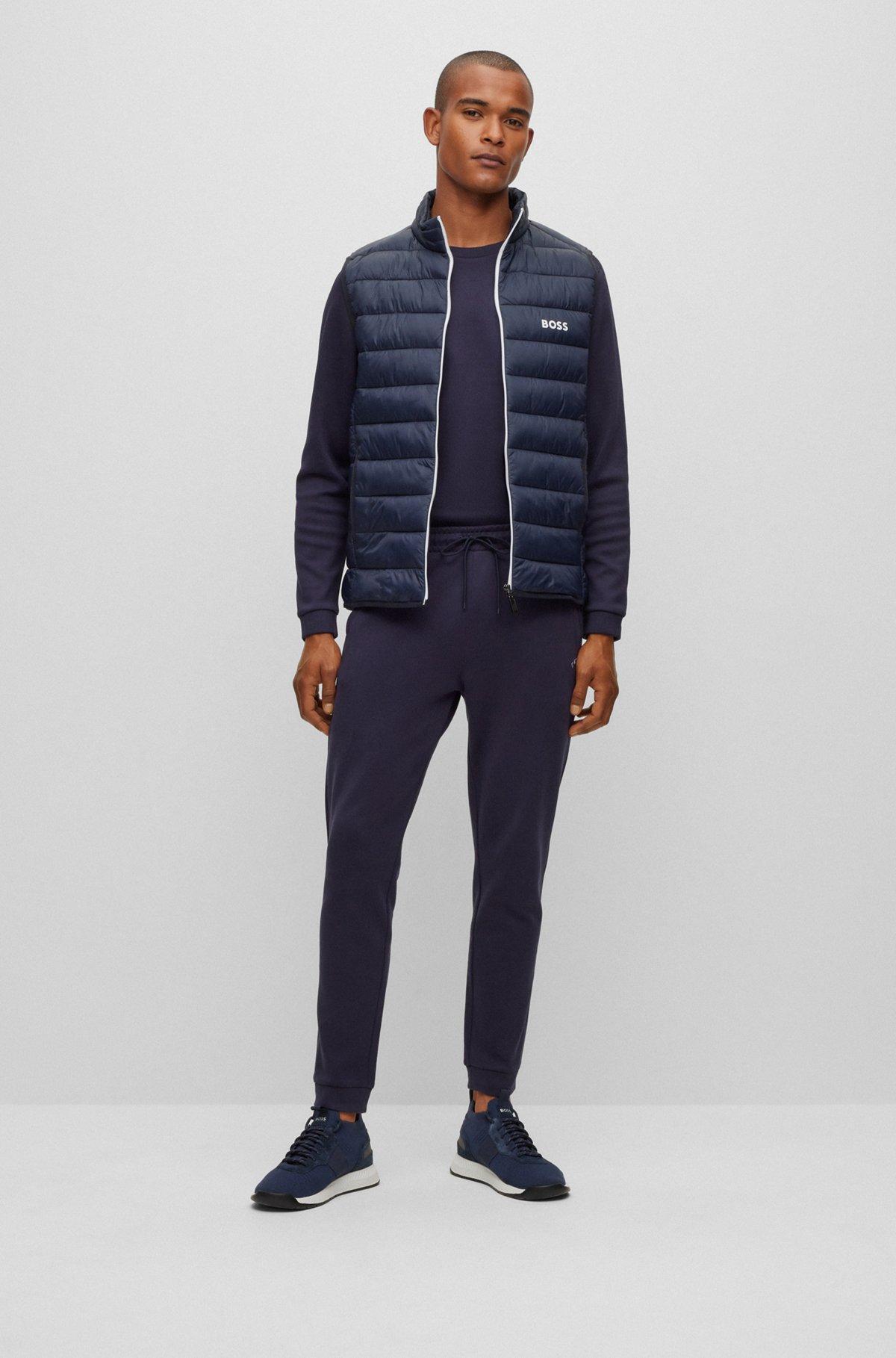Cotton tracksuit bottoms with curved logo Product Image
