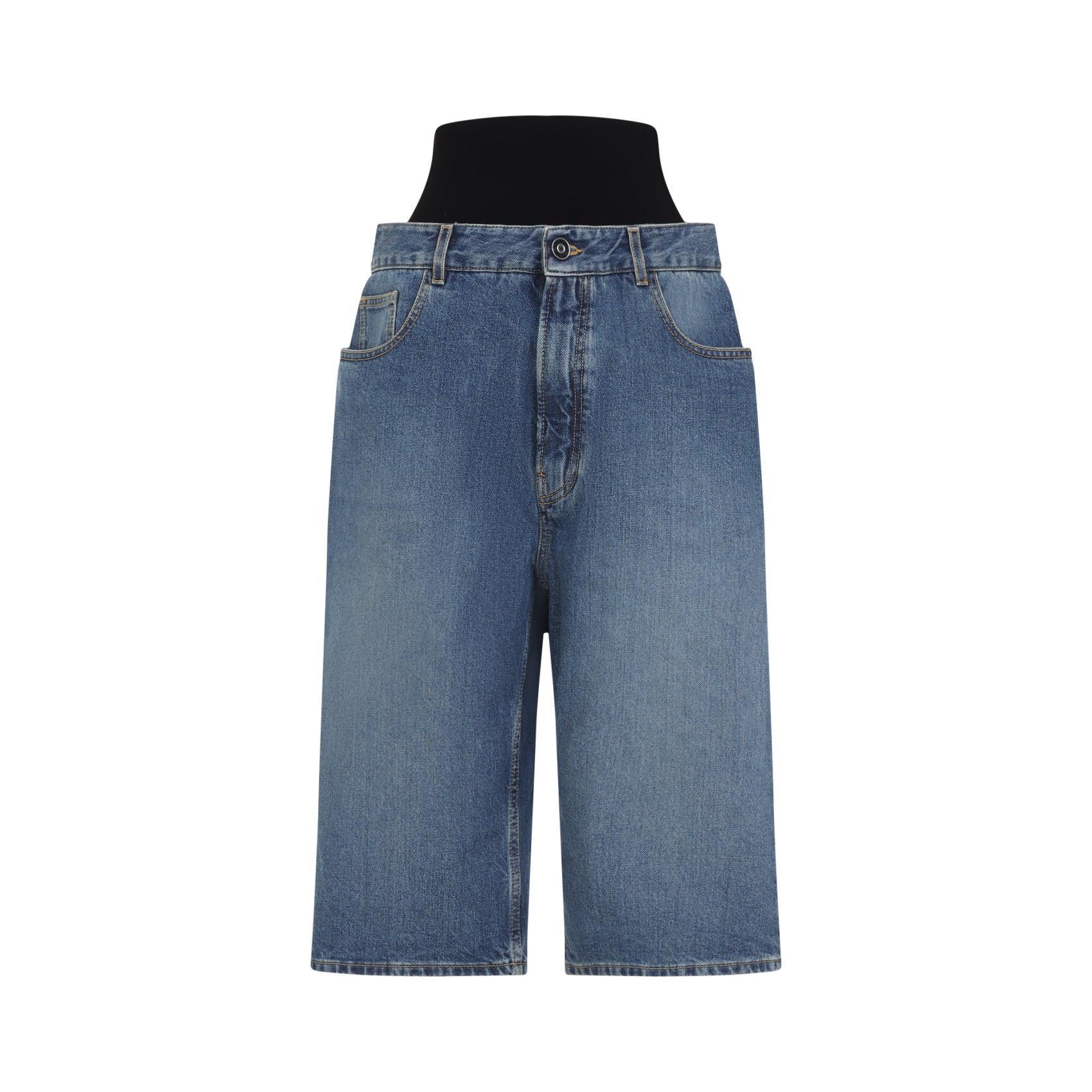 ALAÏA Cropped Barrel-leg Jeans In Blue Product Image