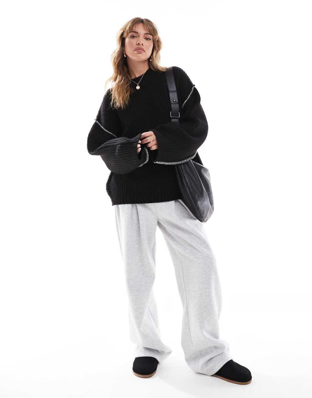 ASOS DESIGN crew neck sweater with contrast blanket stitch in black Product Image