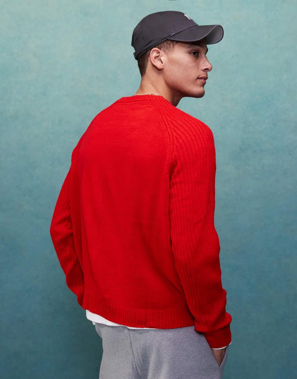 ASOS DESIGN oversized boxy fit knitted crew neck sweater with rib sleeves in red Product Image